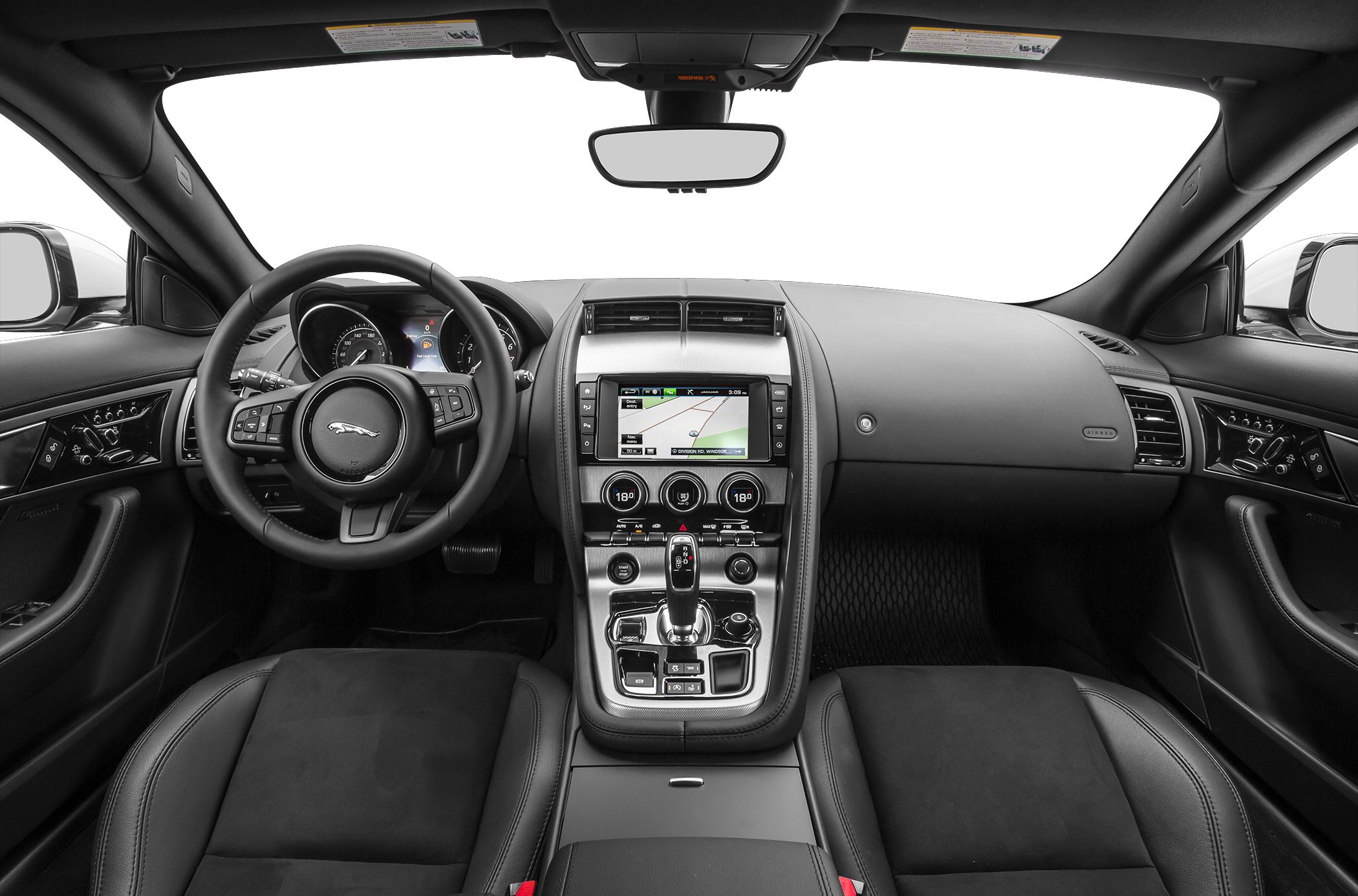 Interior with dashboard, steering wheel, infotainment system, and center console.
