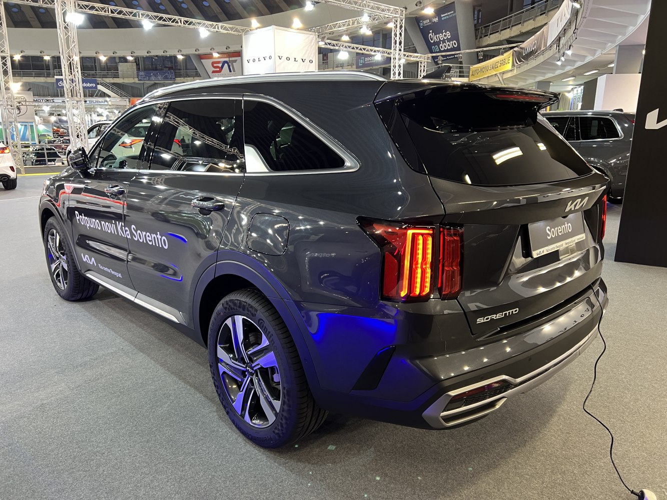 Rear side view showing vertical LED tail lamps and alloy wheels.