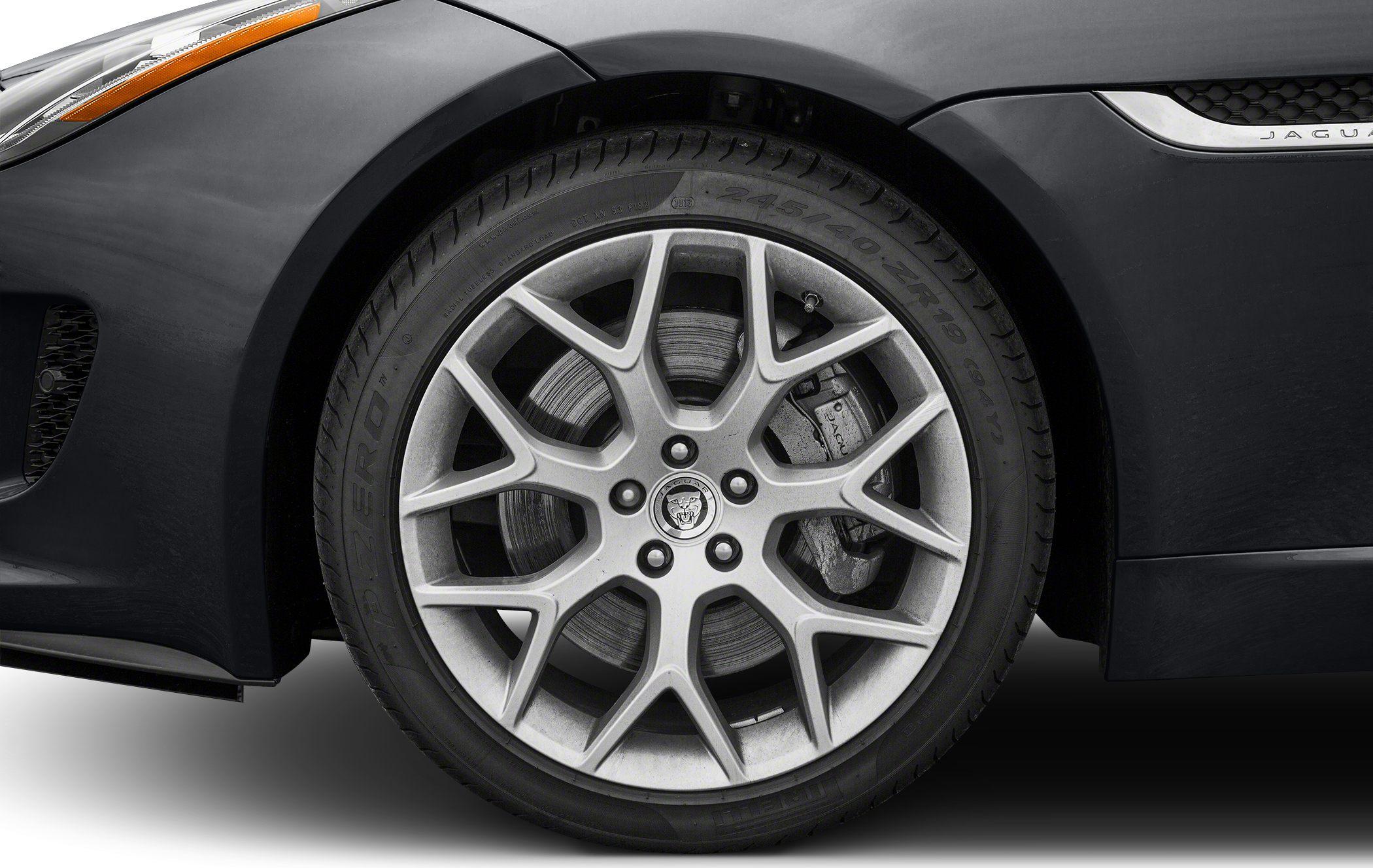 Close-up of alloy wheel and brake caliper on a sporty vehicle