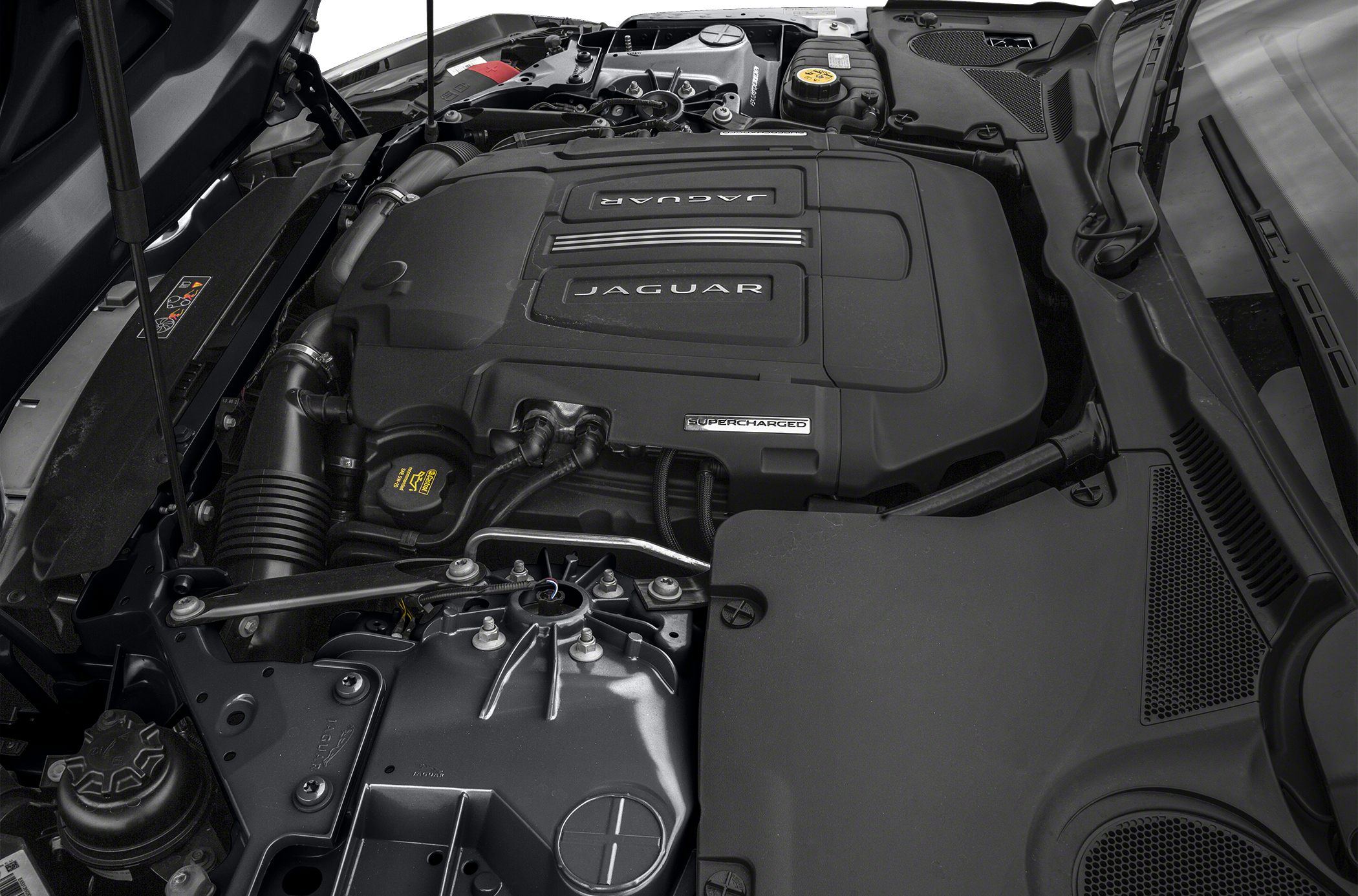 Supercharged engine with Jaguar branding in engine bay