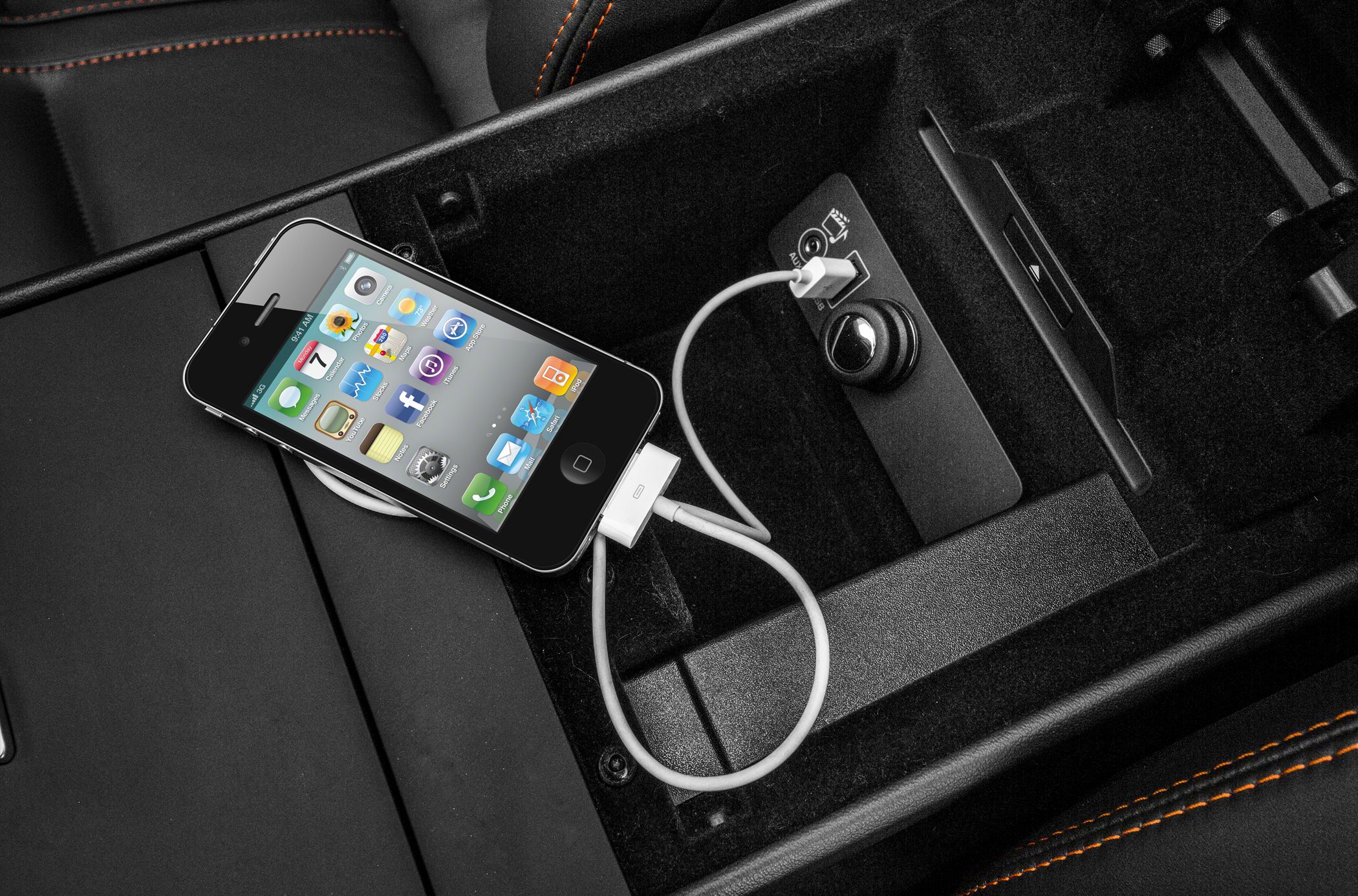 Center console USB and aux charging port with phone connected