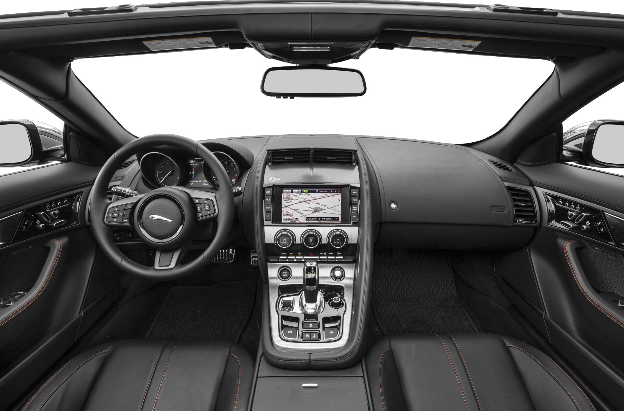 Luxury convertible interior with dashboard, steering wheel, infotainment system