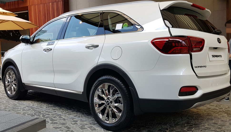 Rear side view of SUV with alloy wheels and distinct taillights