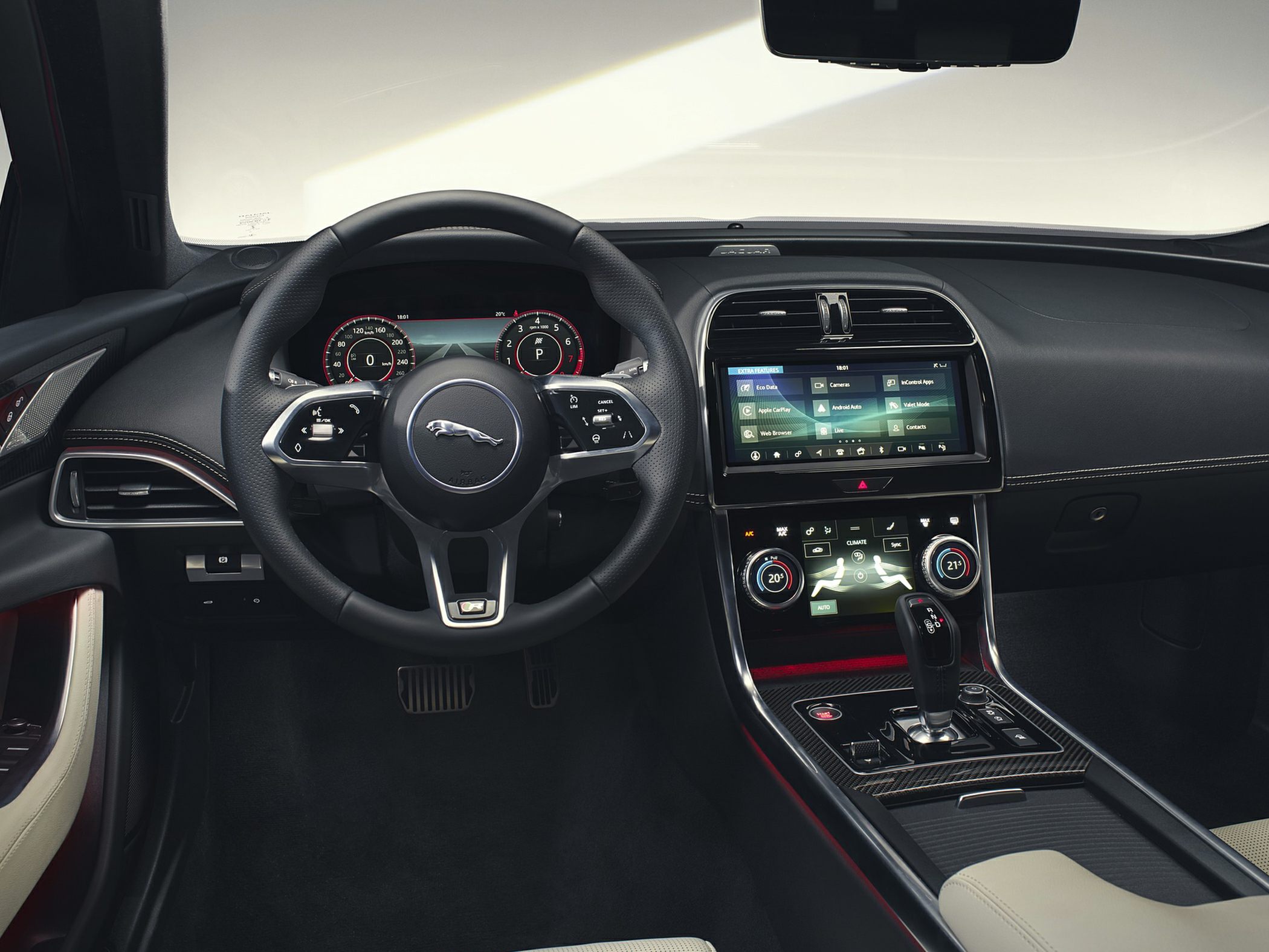 Digital dashboard, touchscreen climate control, steering wheel with integrated controls