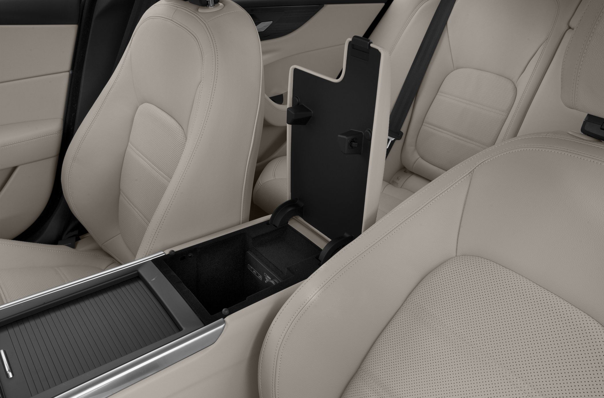 Beige leather seats and center console storage compartment