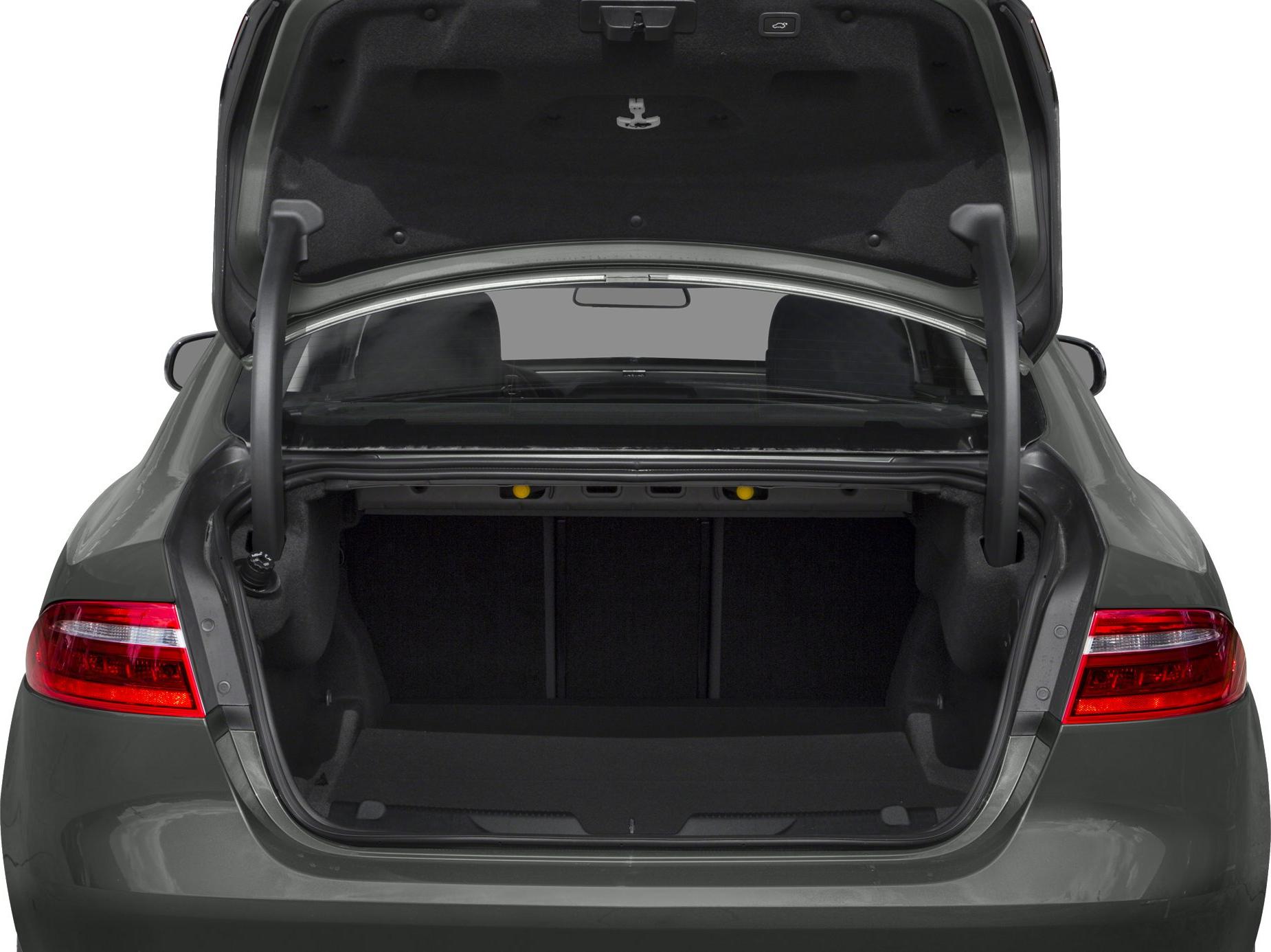 Open sedan trunk showing spacious cargo area with visible hinges and tail lights