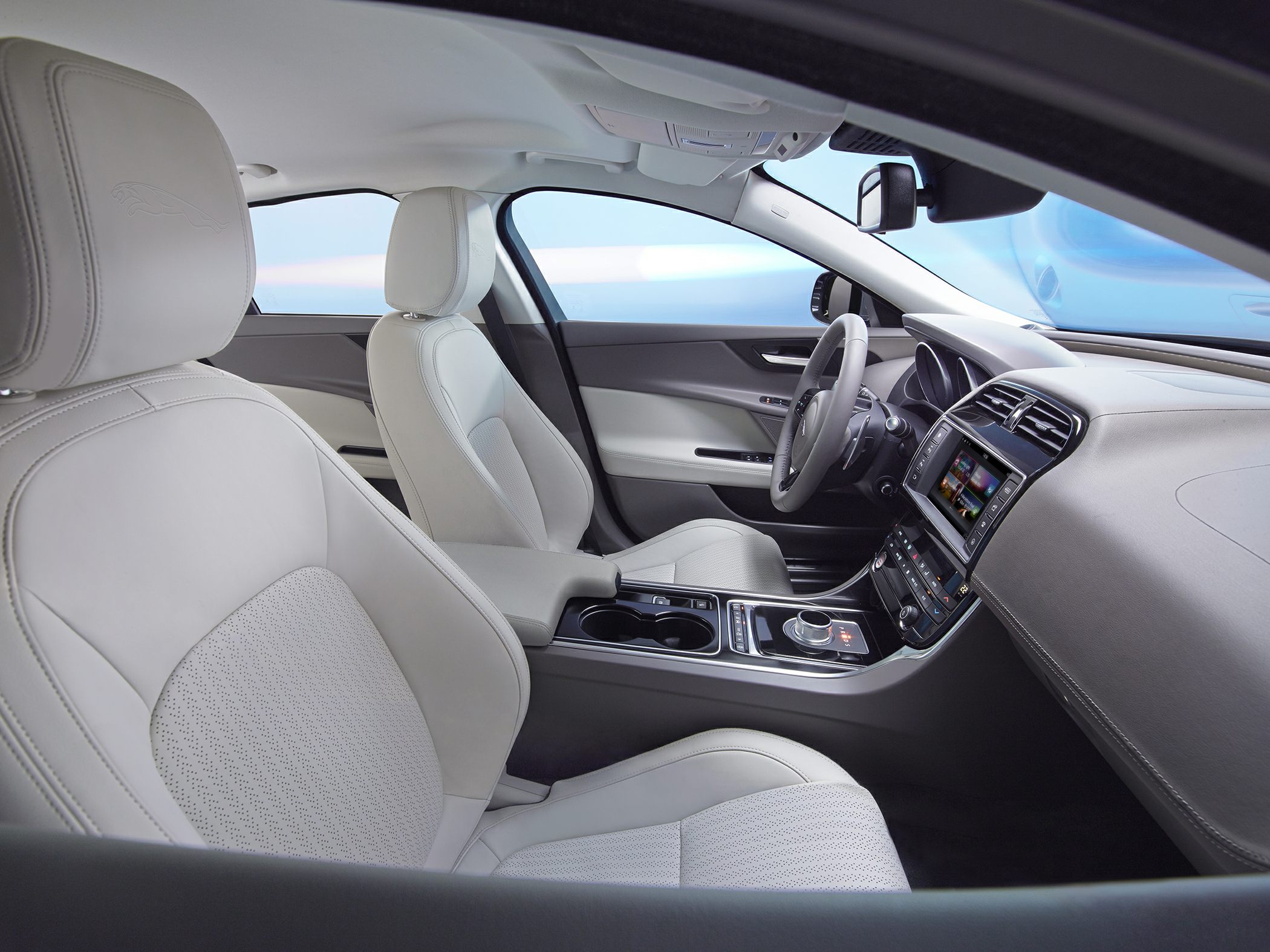 Luxury leather seats and touchscreen console in front cabin