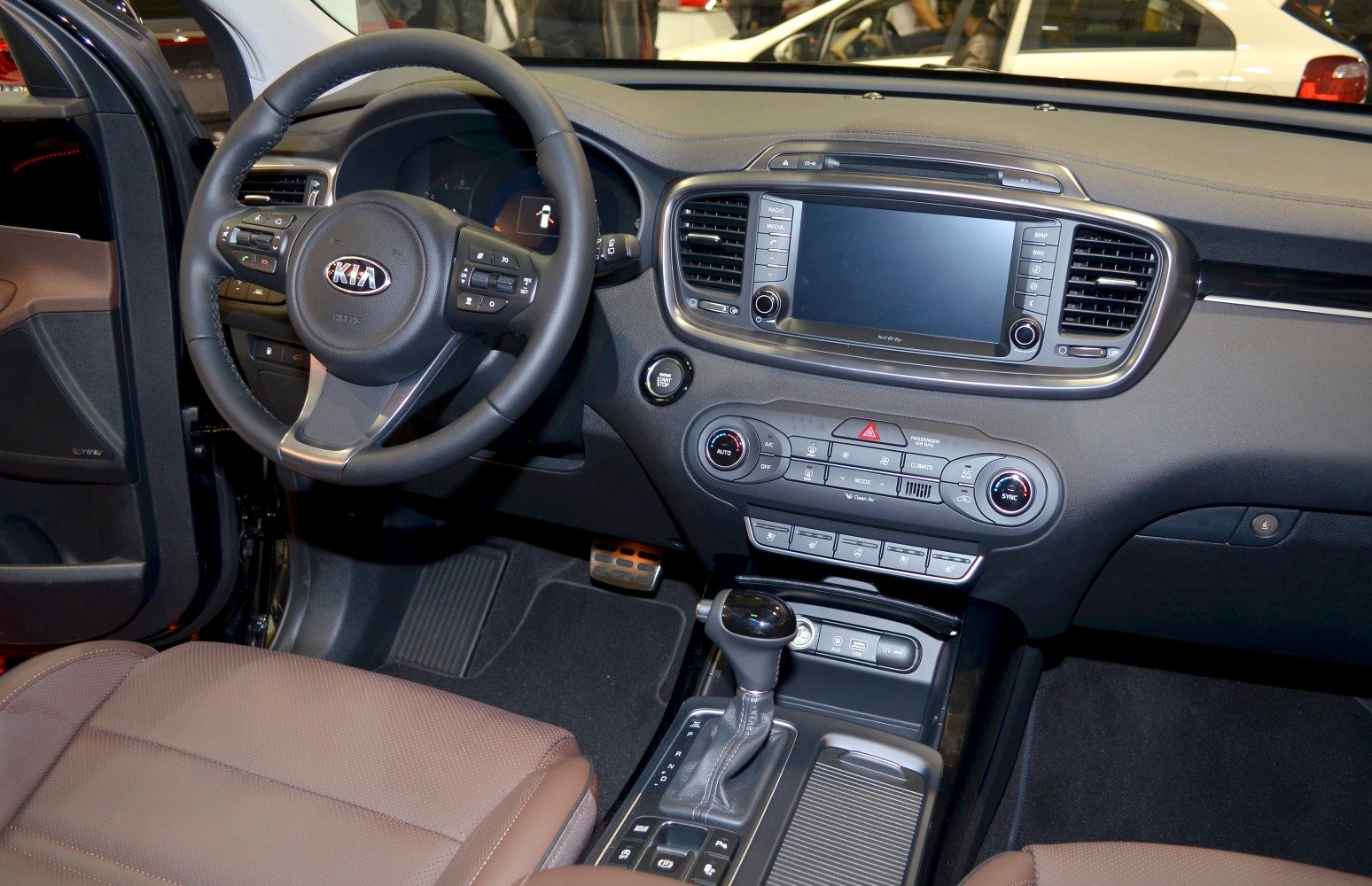 Interior dashboard and steering wheel with infotainment system