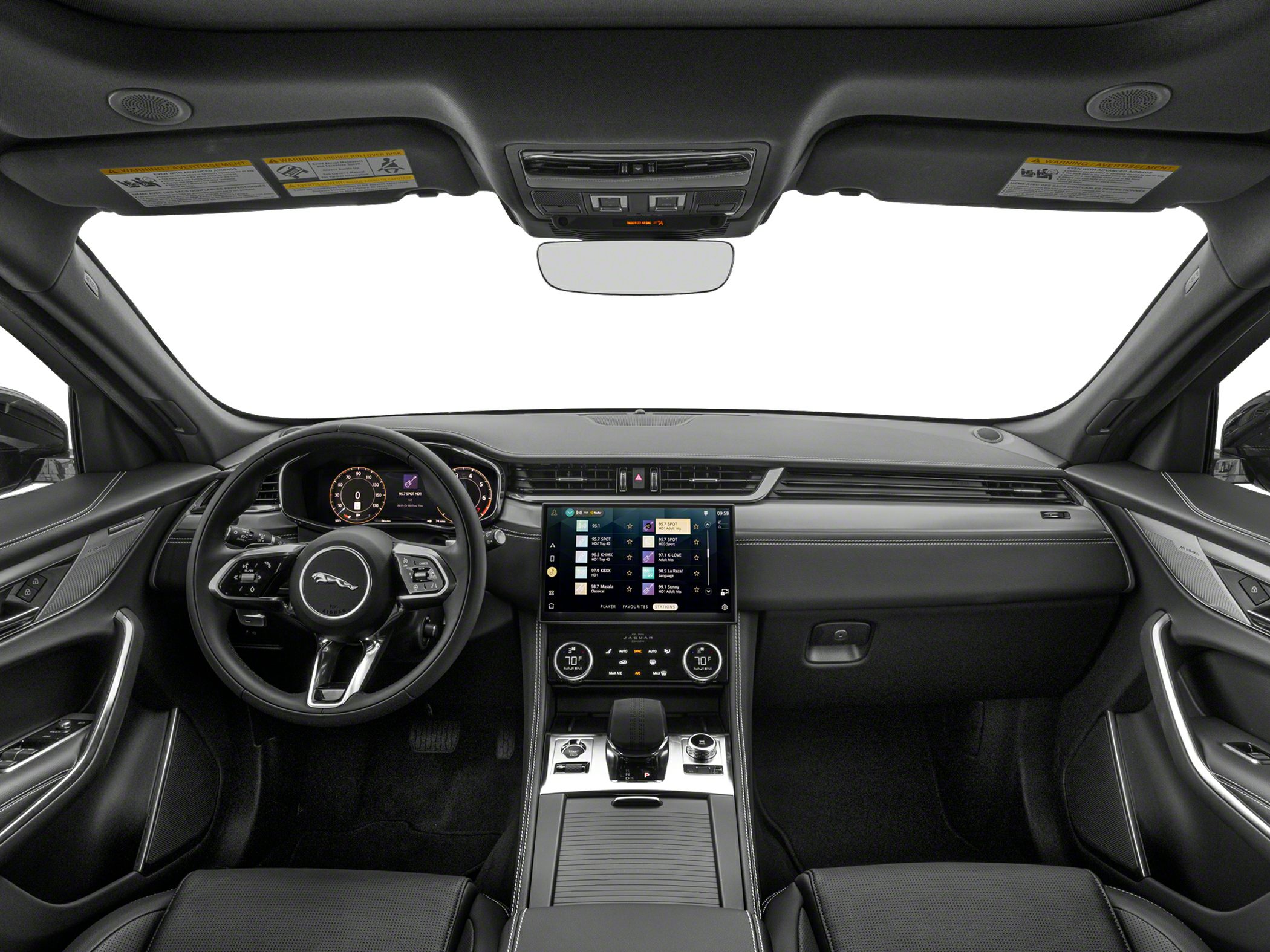 Car interior with digital dashboard and touchscreen central console.