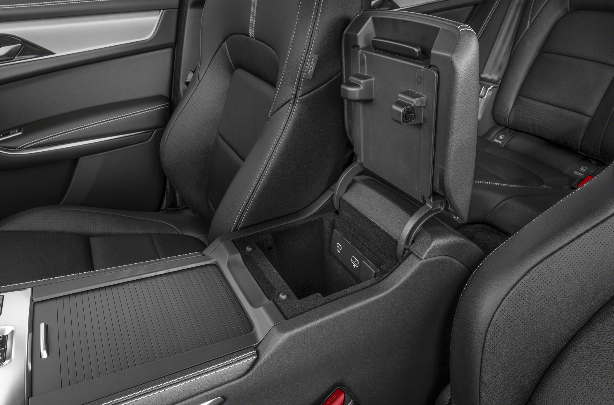 Center console storage compartment with USB ports in leather-trimmed interior