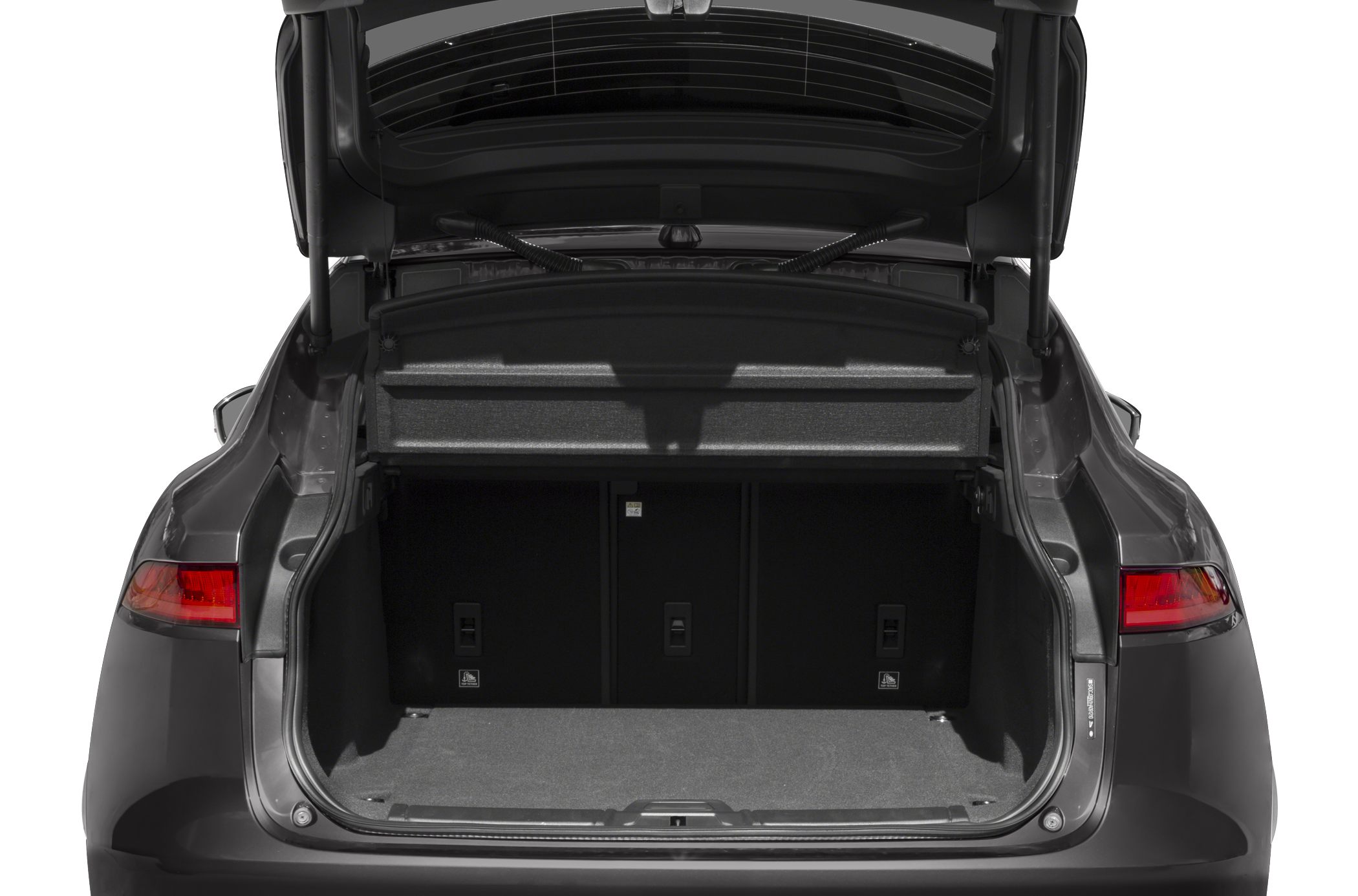 Open rear trunk with spacious cargo area and retractable cover