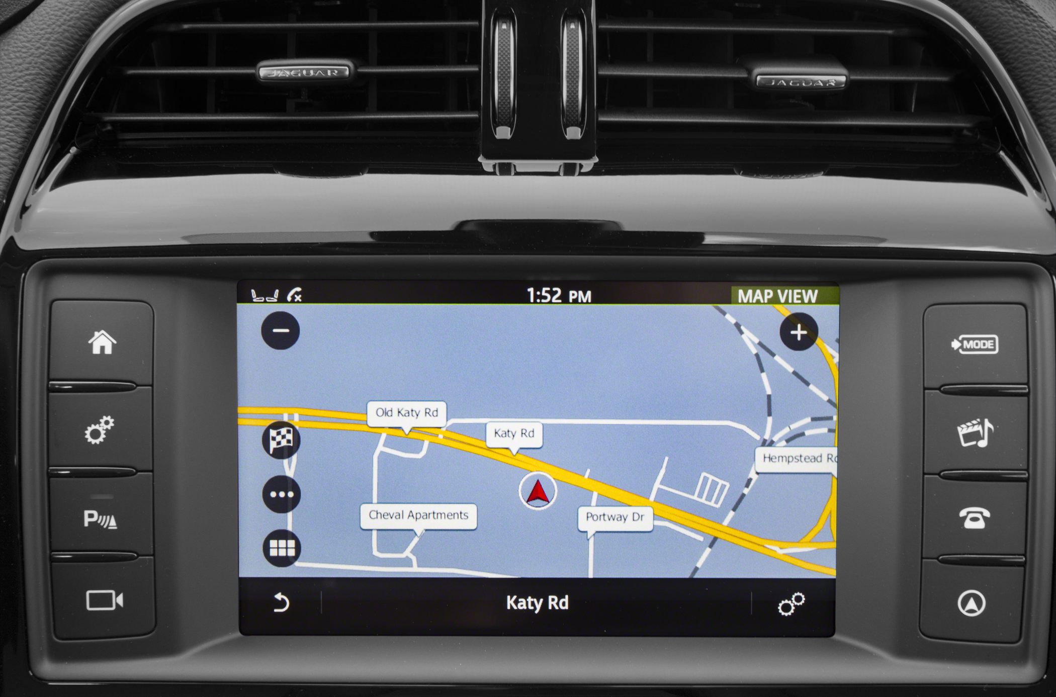 Car infotainment screen displaying detailed GPS navigation map with roads and landmarks
