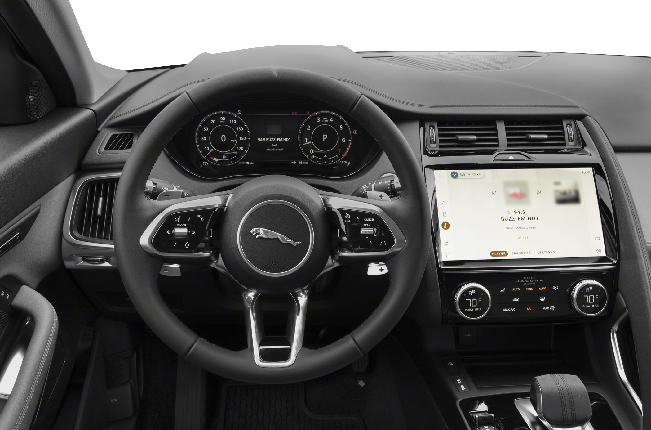 Digital instrument cluster and touchscreen infotainment system in luxury SUV interior