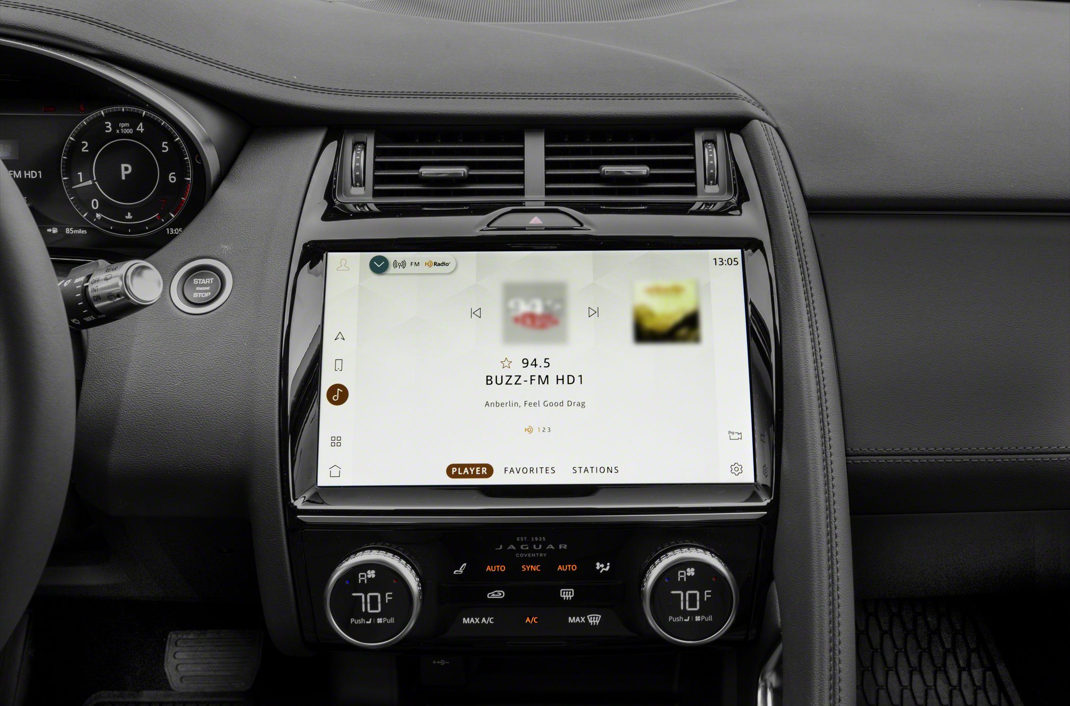 Touchscreen infotainment and dual-zone climate controls in modern car dashboard