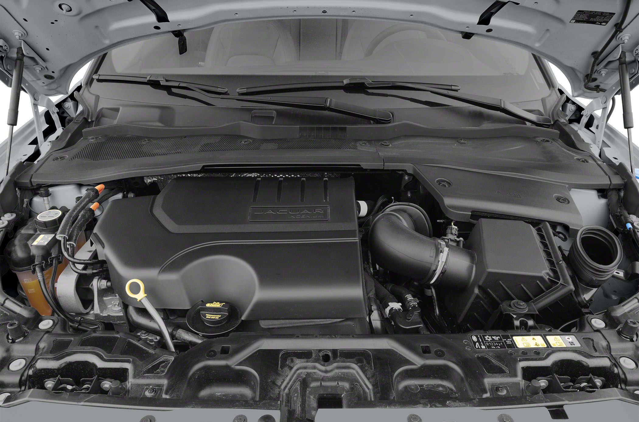 Clean, modern engine bay with Jaguar engine cover and components