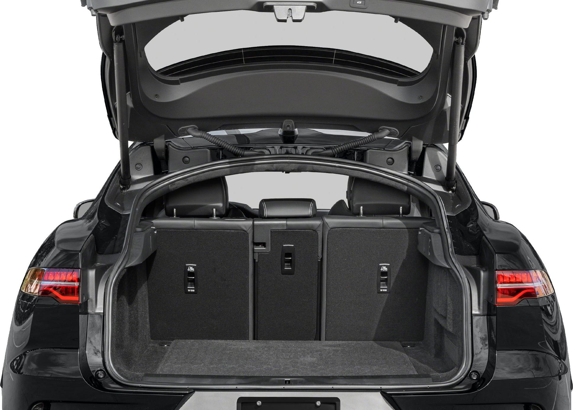 Spacious rear trunk with open hatch and foldable rear seats in luxury electric SUV