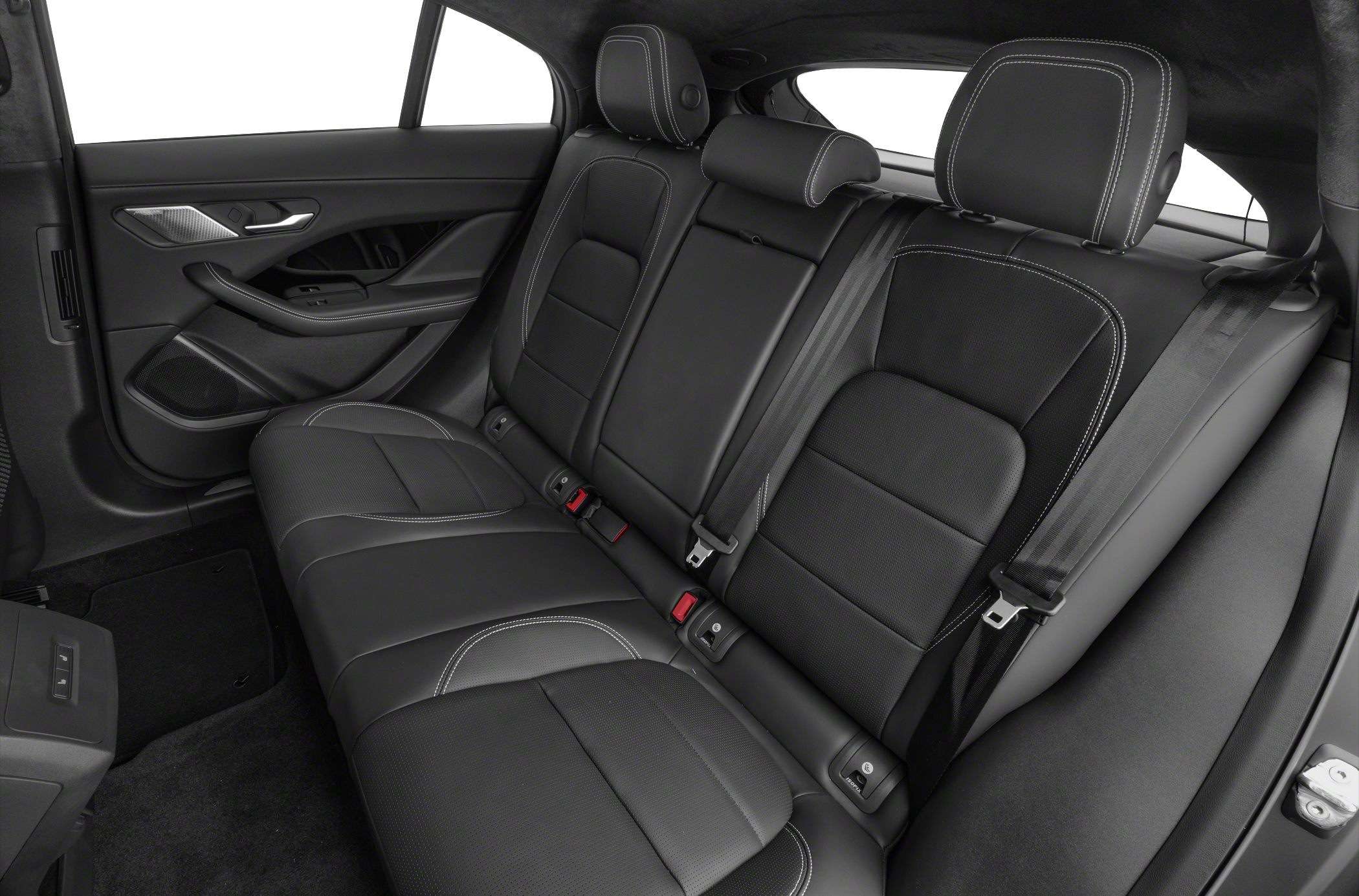 Black leather rear seats with white stitching and integrated headrests.