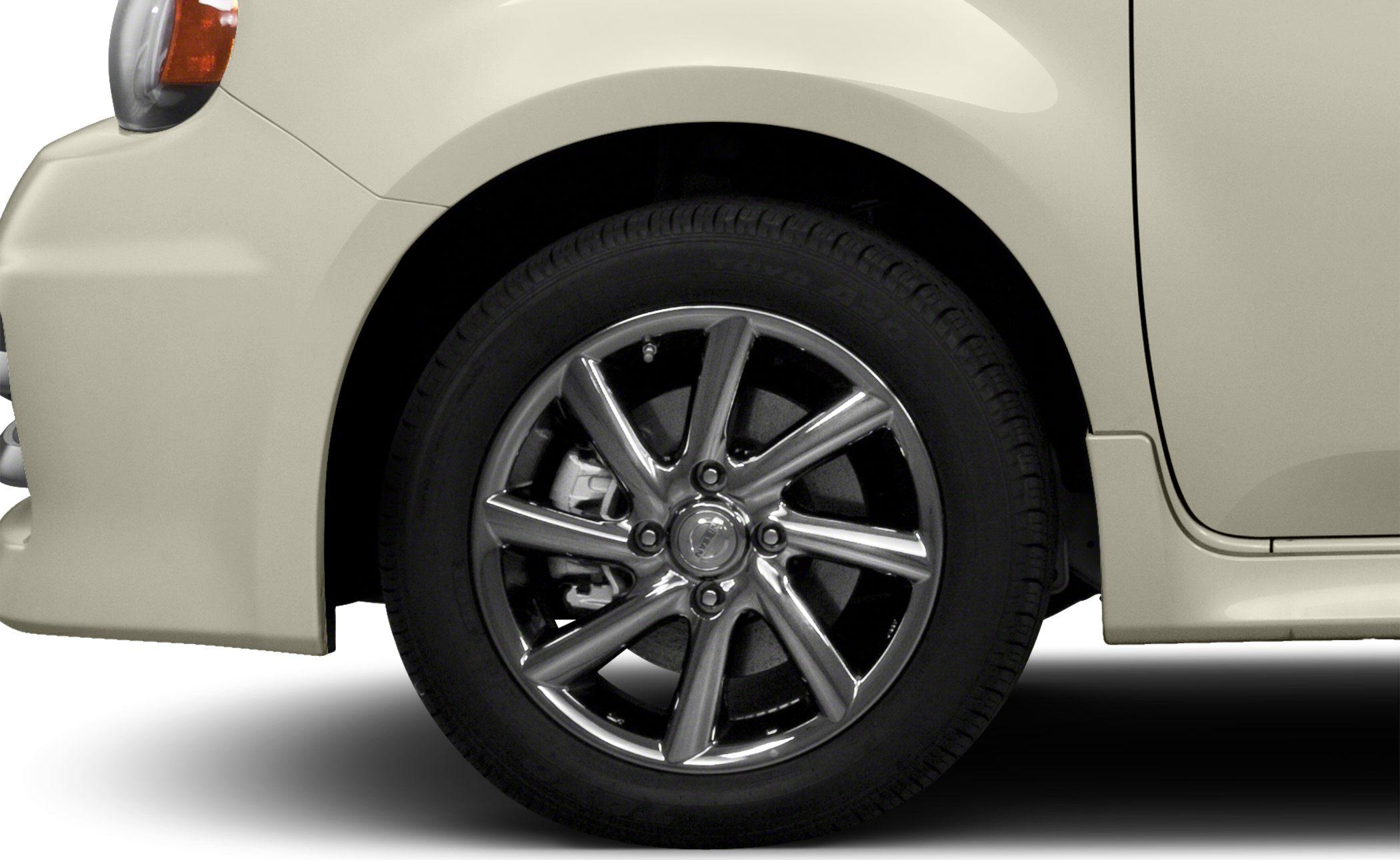 Close-up of a multi-spoke alloy wheel with visible brake caliper.