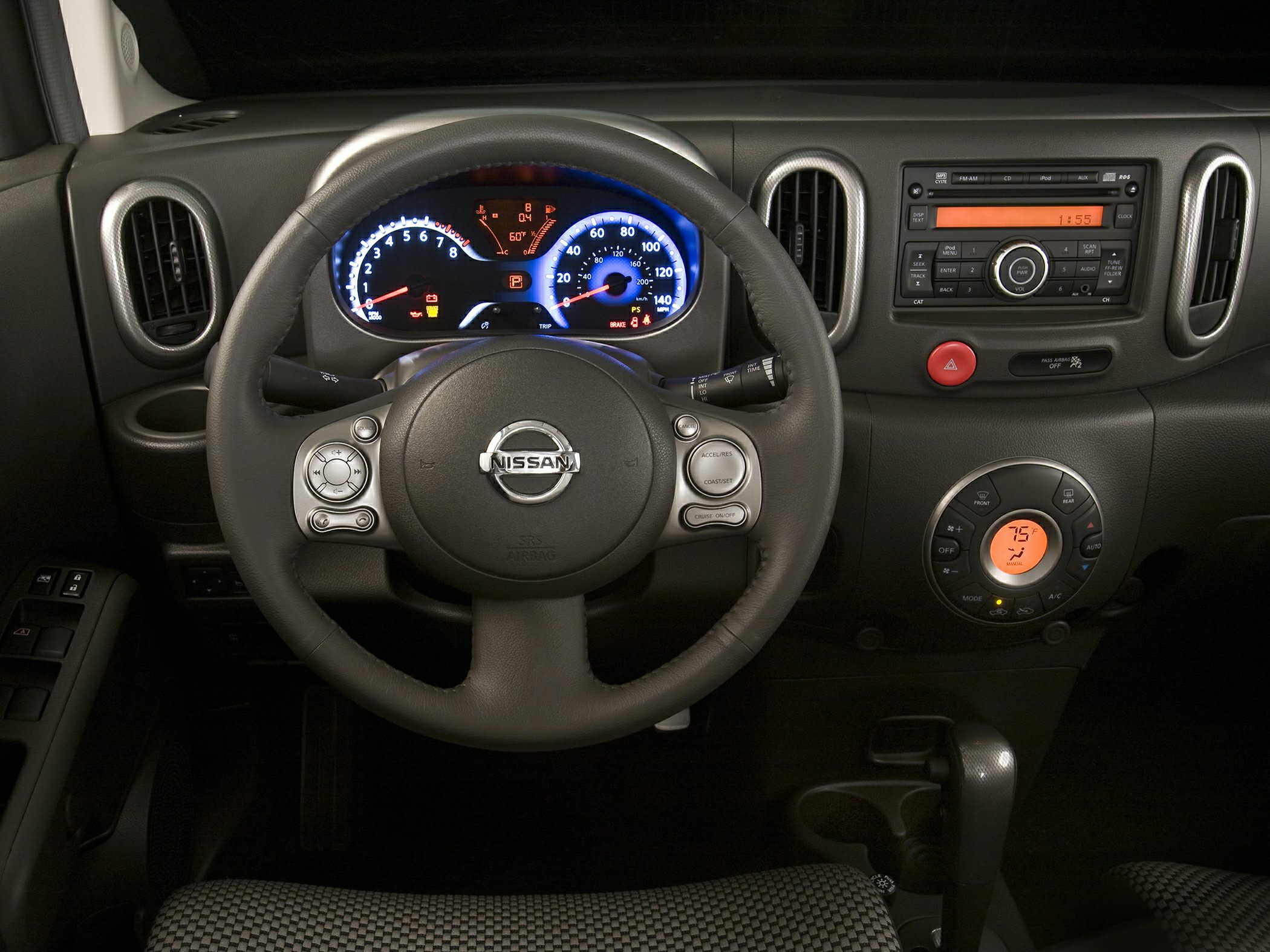 Dashboard with multifunction steering wheel and round climate control
