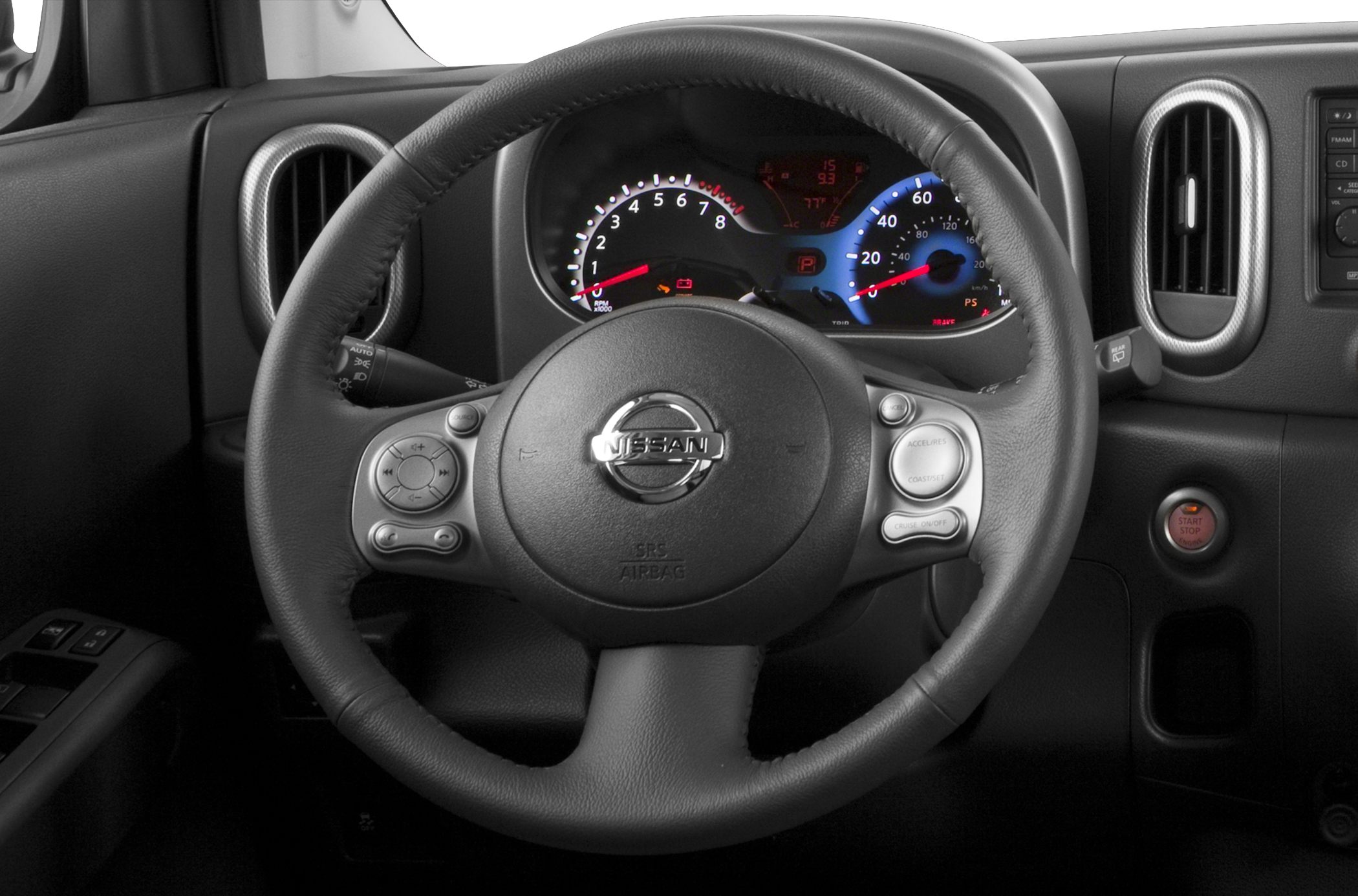 Steering wheel and dashboard with instrument cluster and controls