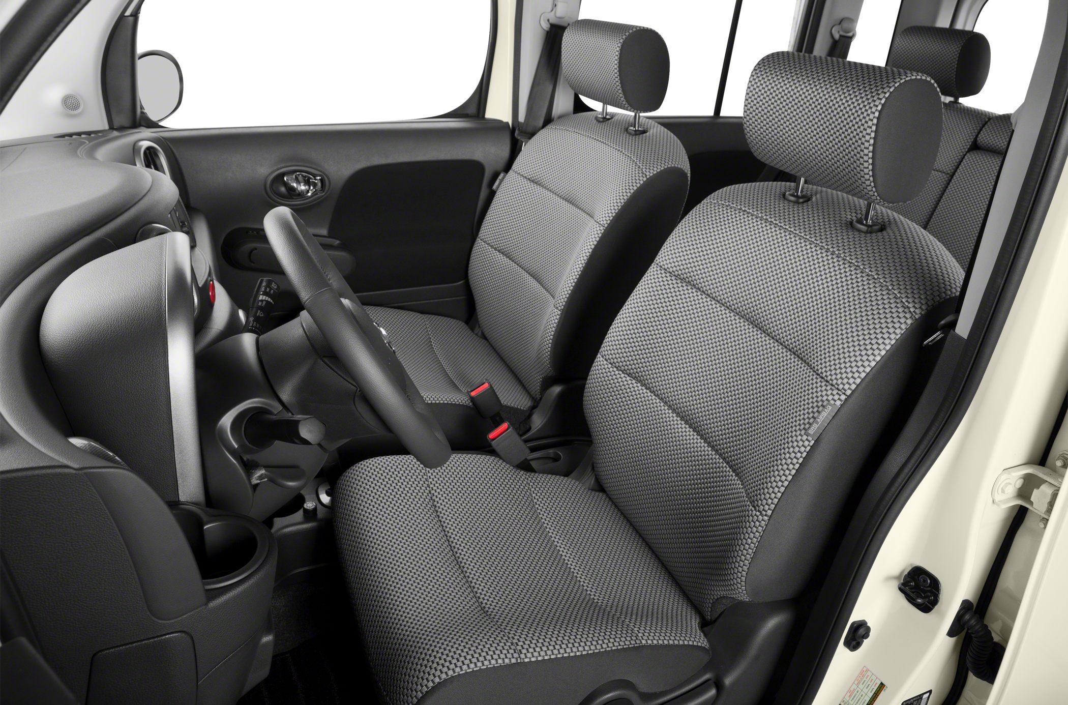 Front seats with textured fabric upholstery and headrests.