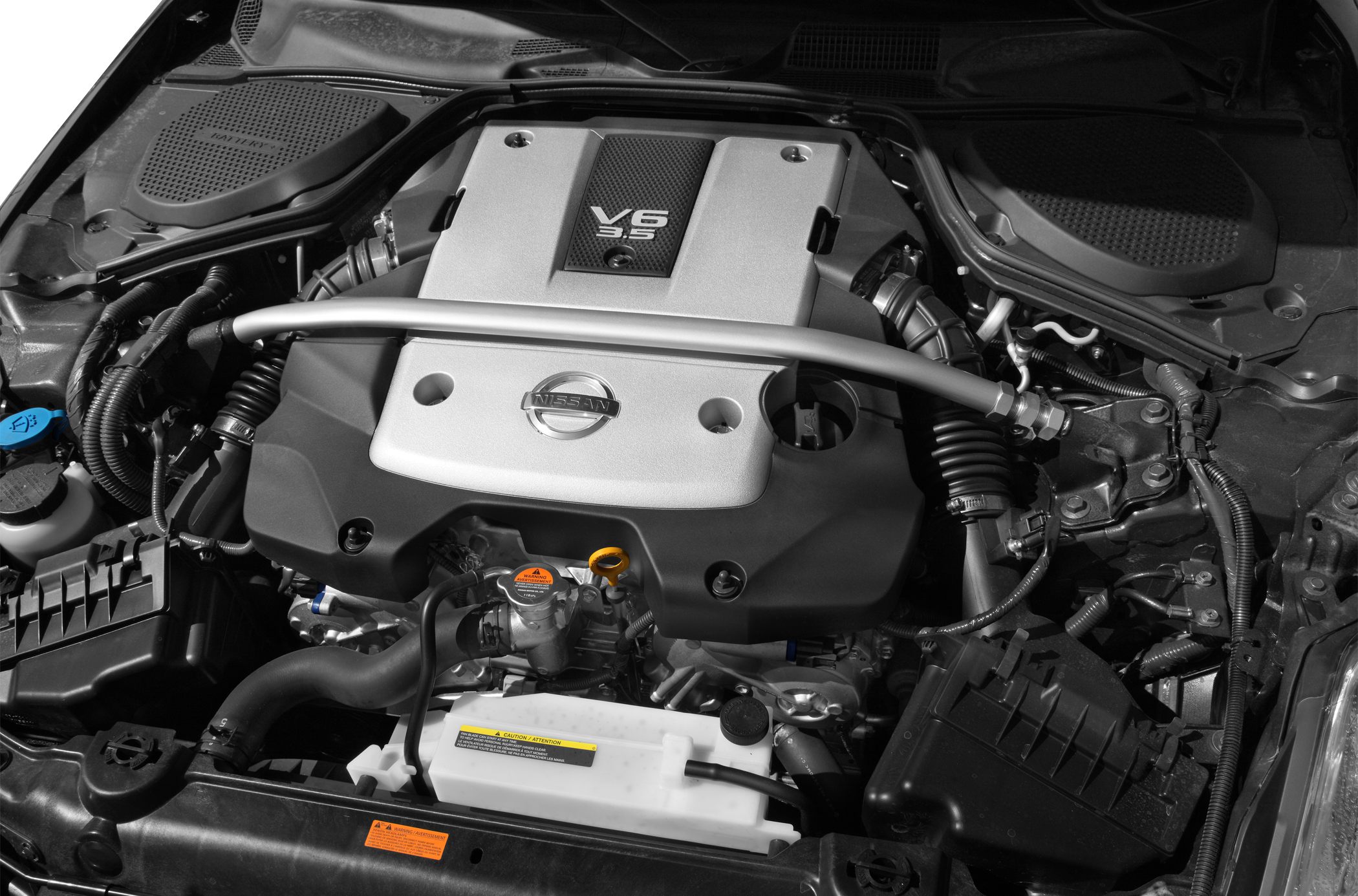 Close-up of V6 3.5L engine with strut brace and components