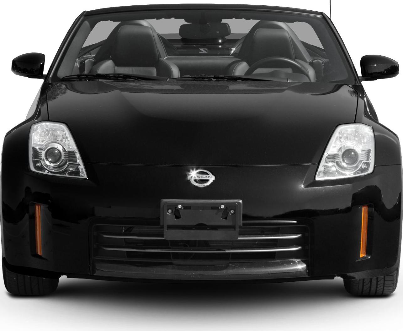 Front view of sporty convertible with headlights and grille