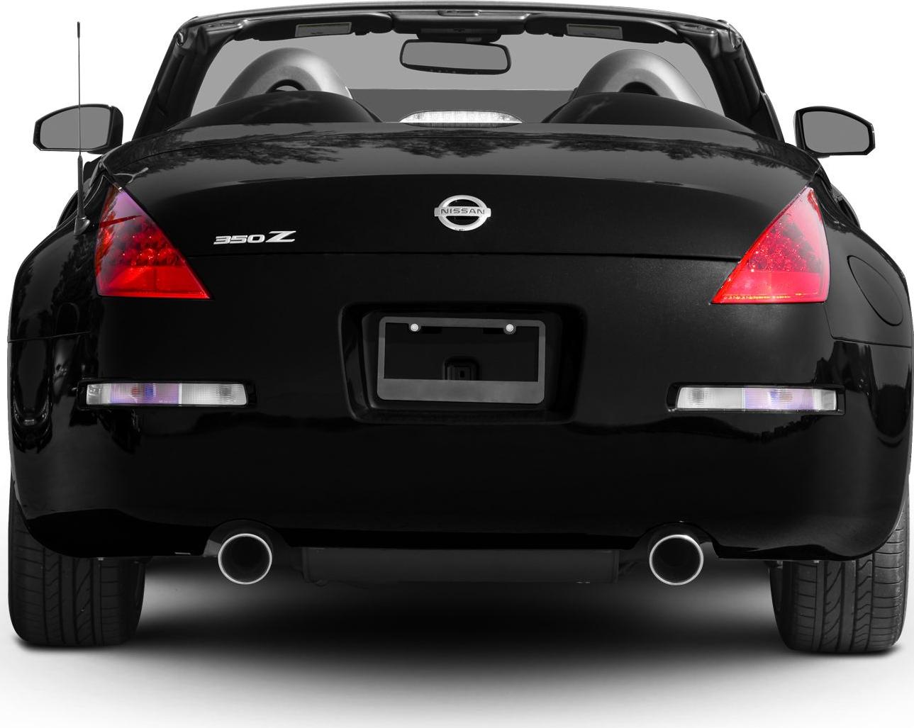 Rear view with dual exhaust and triangular tail lights