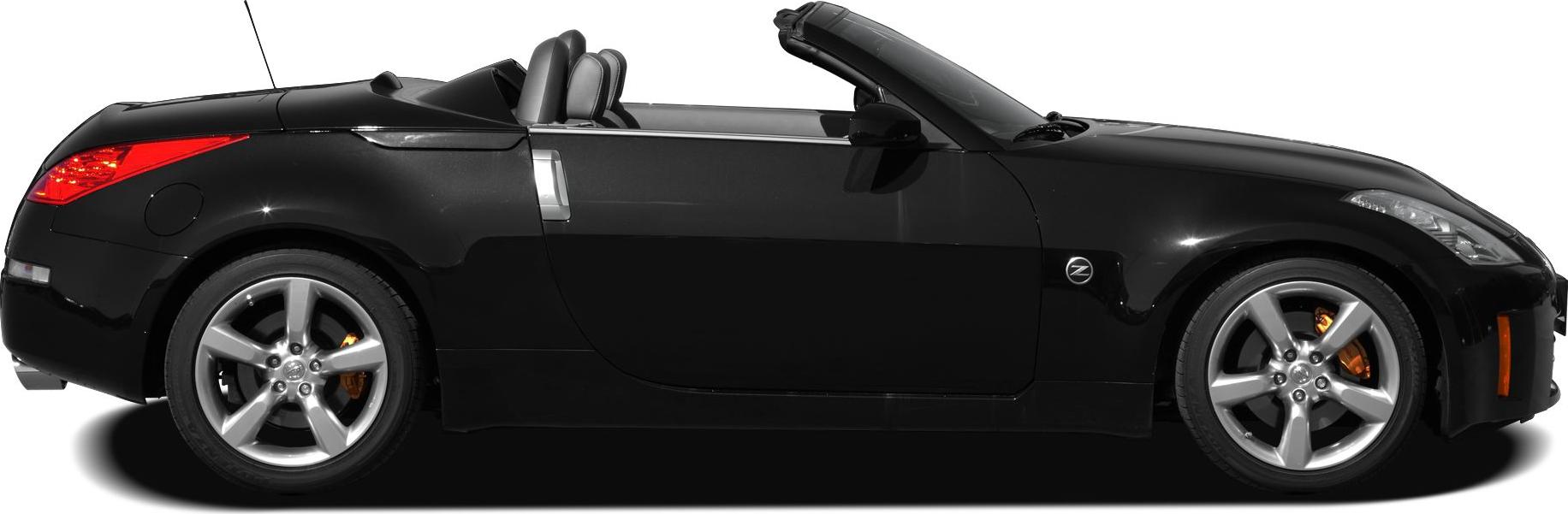 Black convertible sports car side profile with alloy wheels