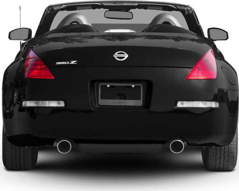 Rear view of a convertible sports coupe with dual exhaust and distinctive triangular taillights