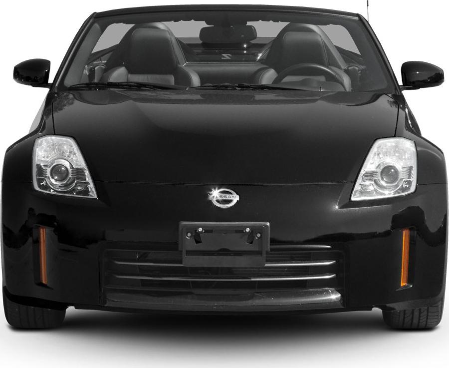 Front view of a convertible sports car with distinctive headlights and wide grille