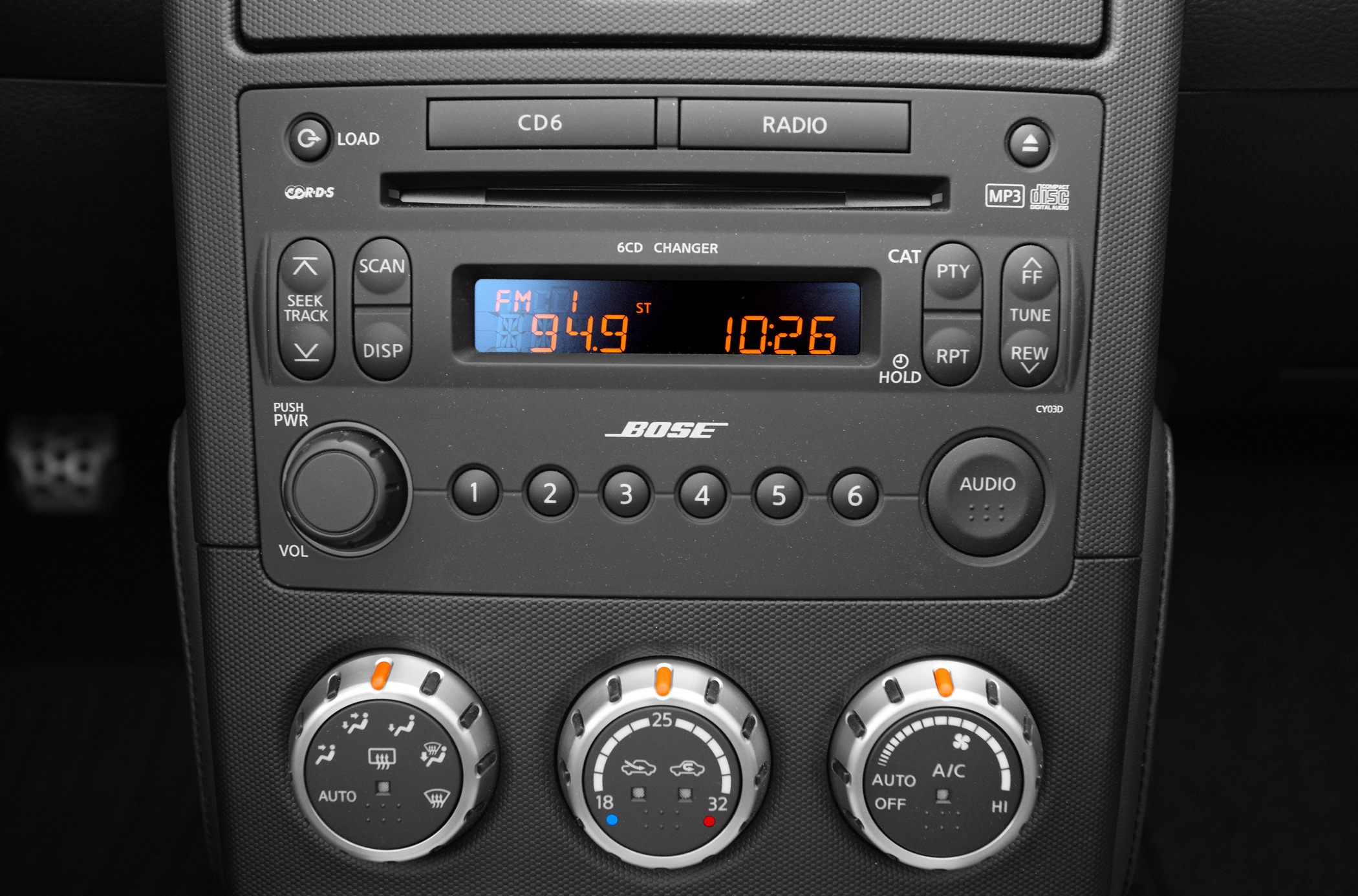 Radio system with Bose audio and climate control dials