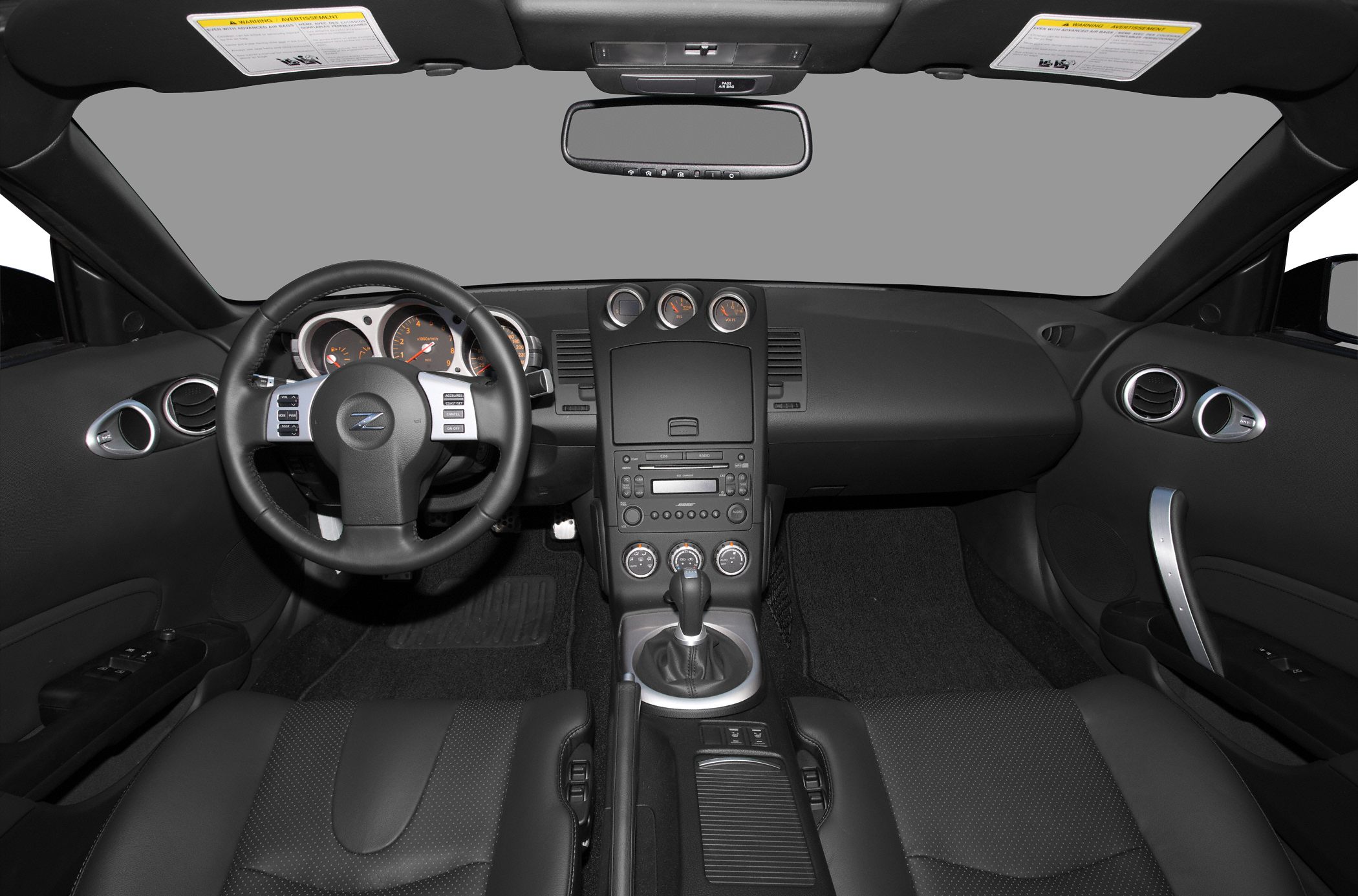 Dashboard, steering wheel, center console, and seats detailed interior