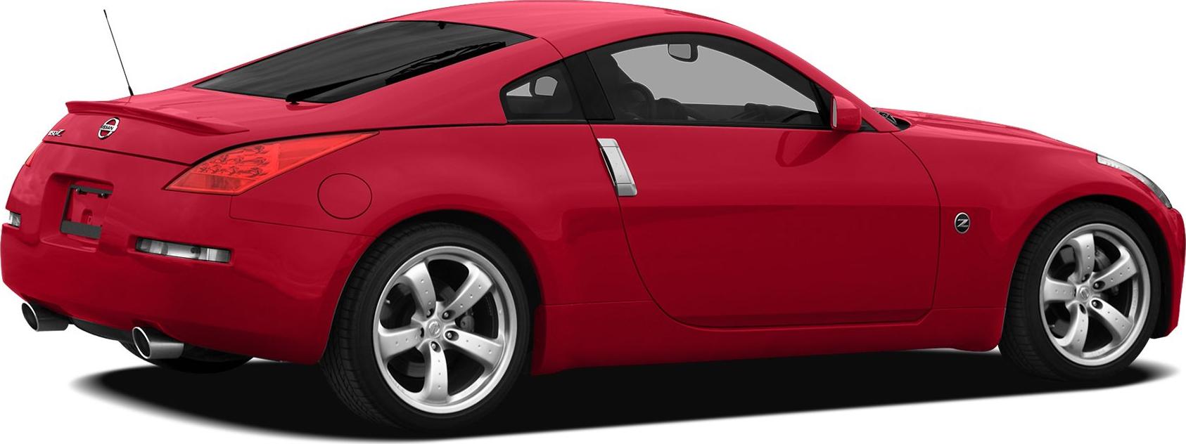 Red coupe rear side profile with dual exhaust and five-spoke rims