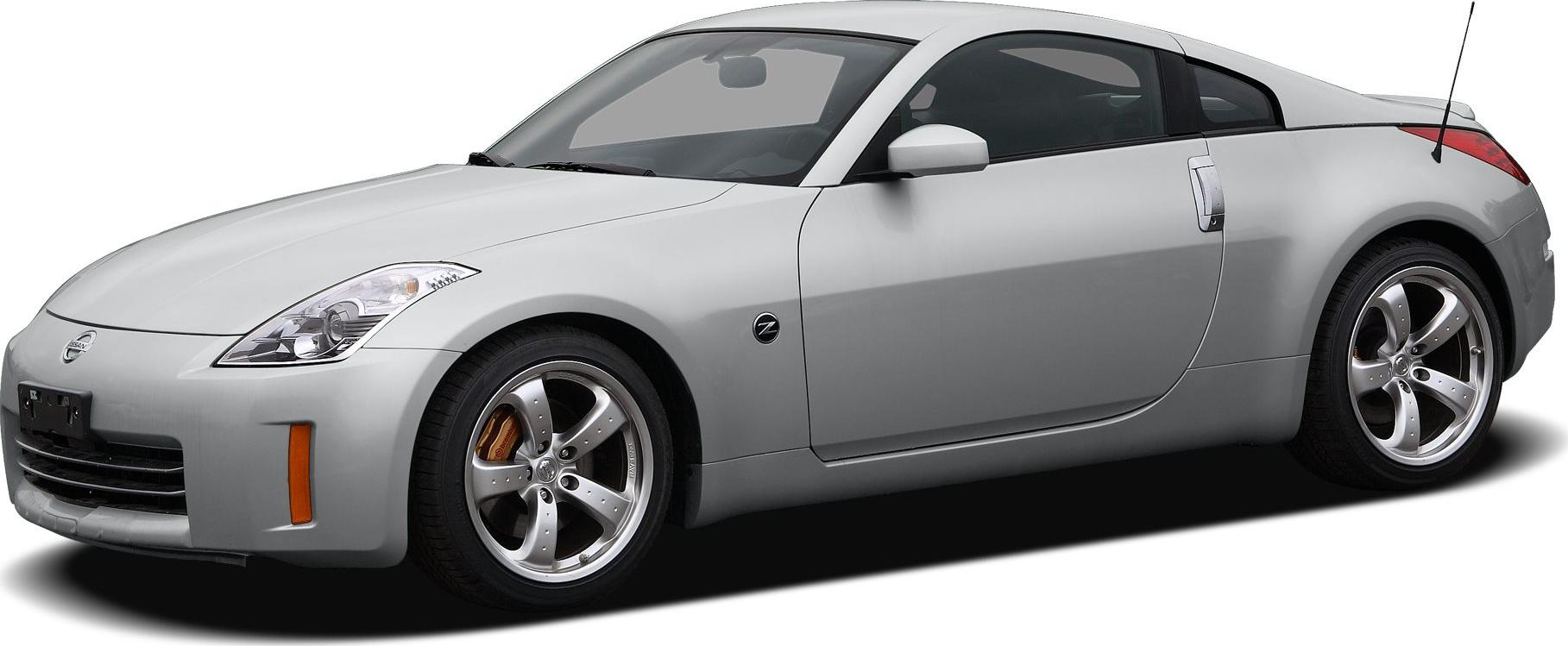 Silver sports coupe with aerodynamic curves and distinctive alloy wheels