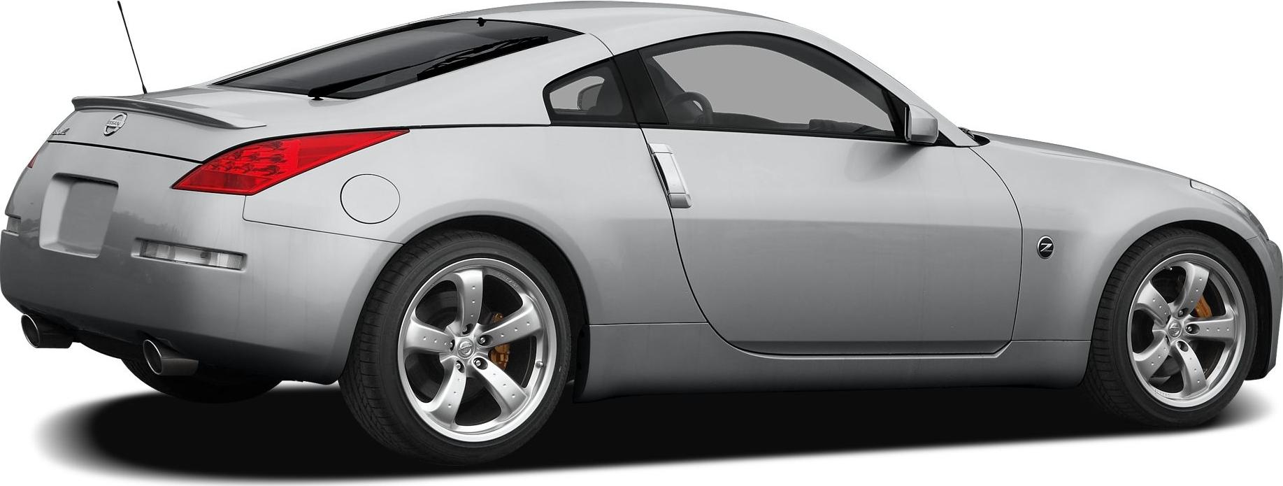 Rear side of silver sports coupe with alloy wheels and distinctive taillights