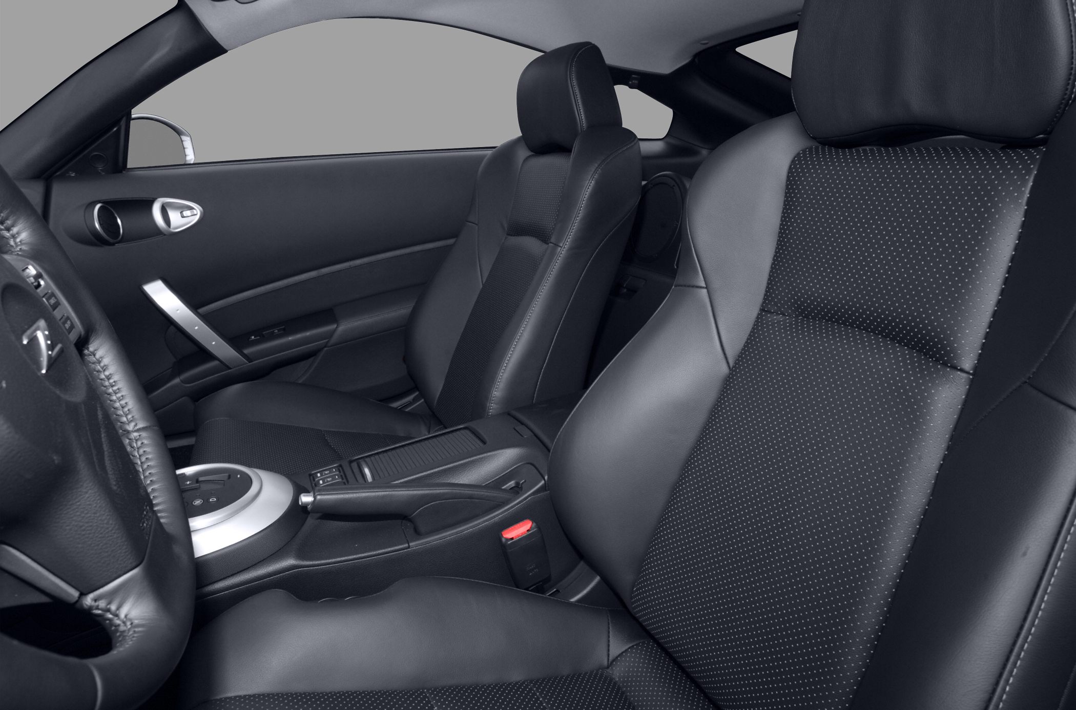 Leather front seats with gear shift and door panel interior details