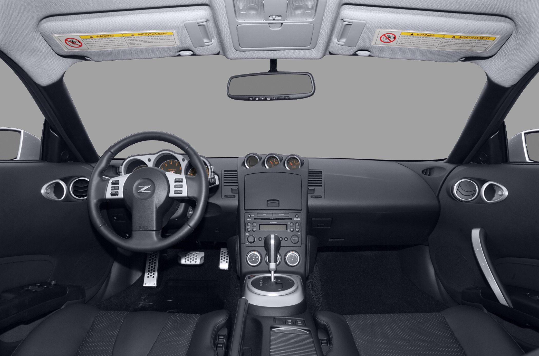Dashboard, steering wheel, and center console interior layout