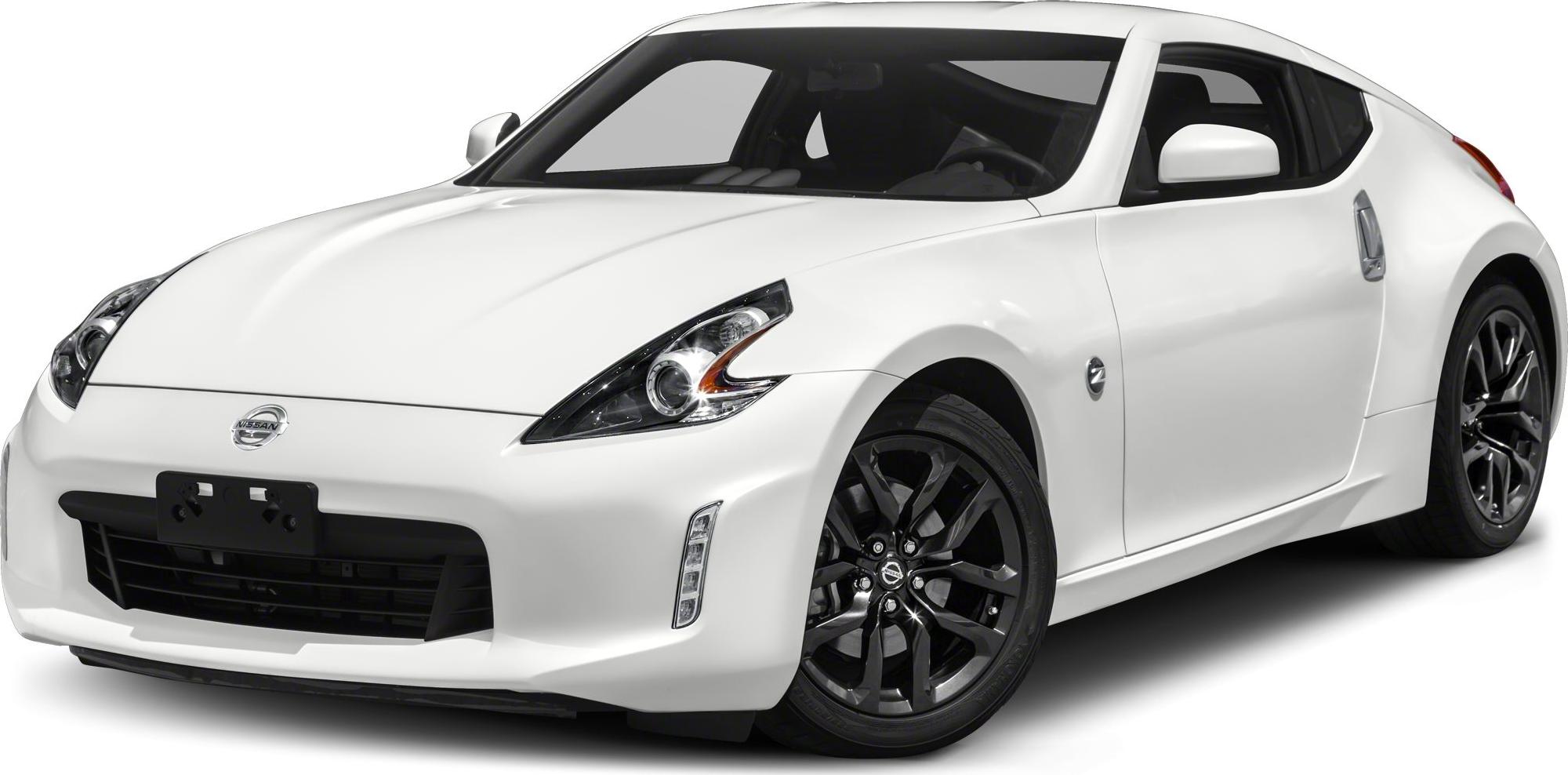Sleek front and side view of a white sports coupe with black alloy wheels