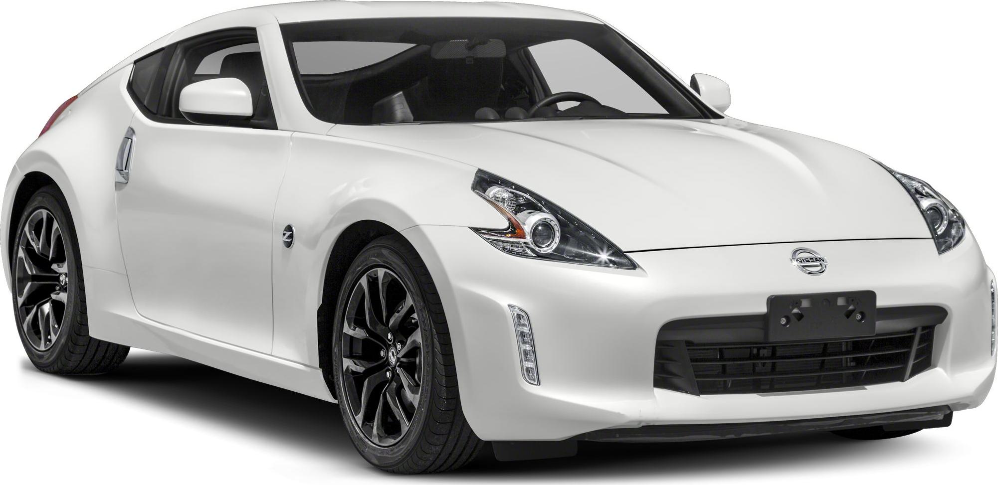 White two-door coupe with sharp headlights and black alloy wheels