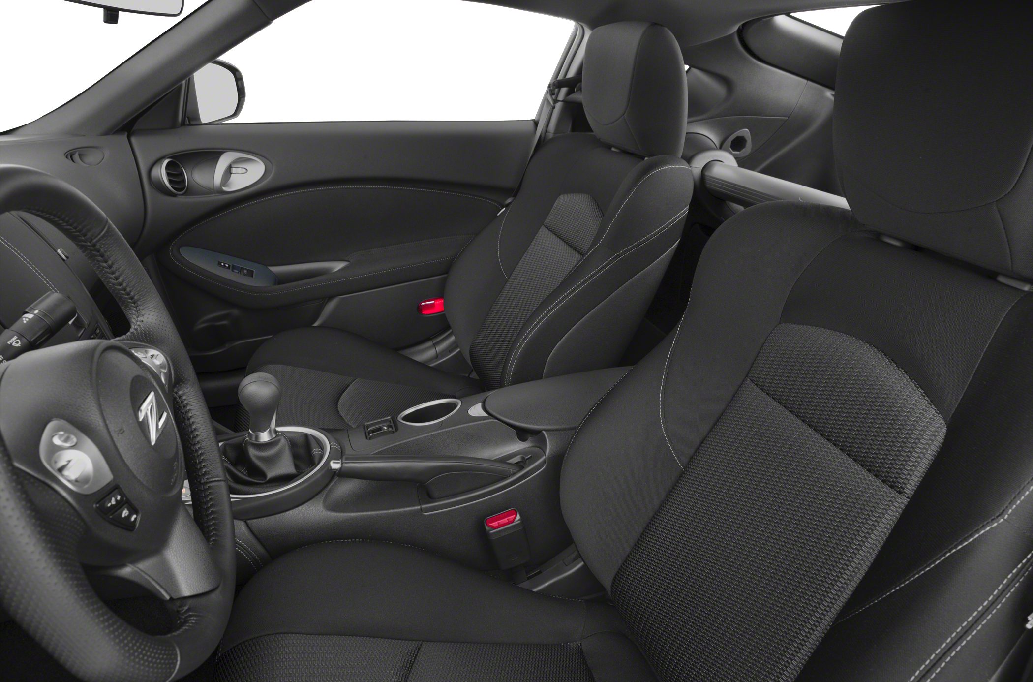Black sporty interior with manual gear shift and stitching details