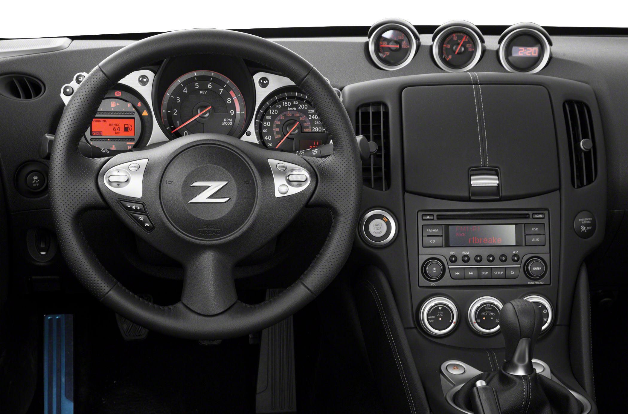 Sporty steering wheel, gauges cluster, and dashboard console with controls