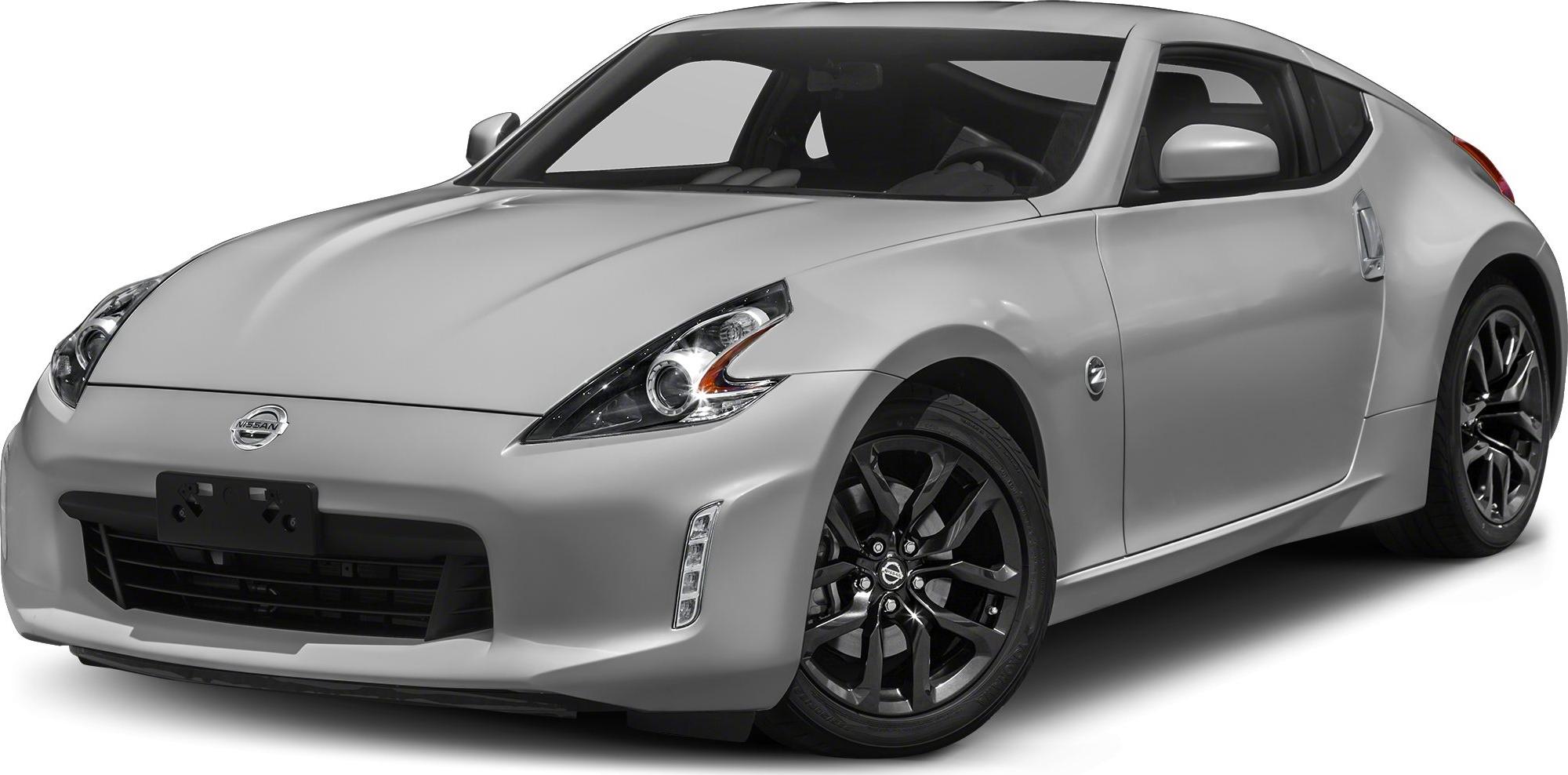 Sharp headlights and black alloy wheels on a sporty coupe