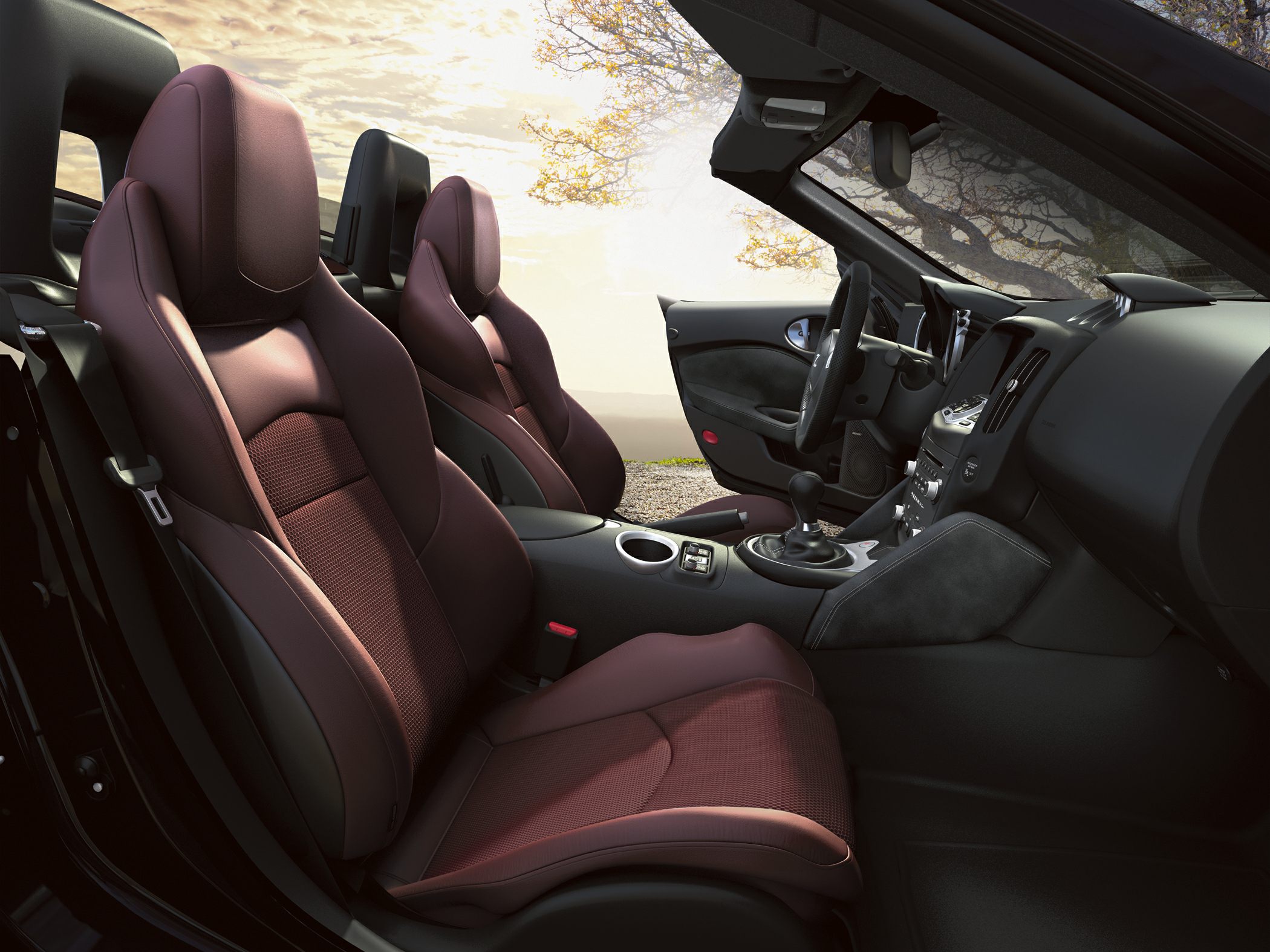 Convertible interior with sporty seats and manual transmission details