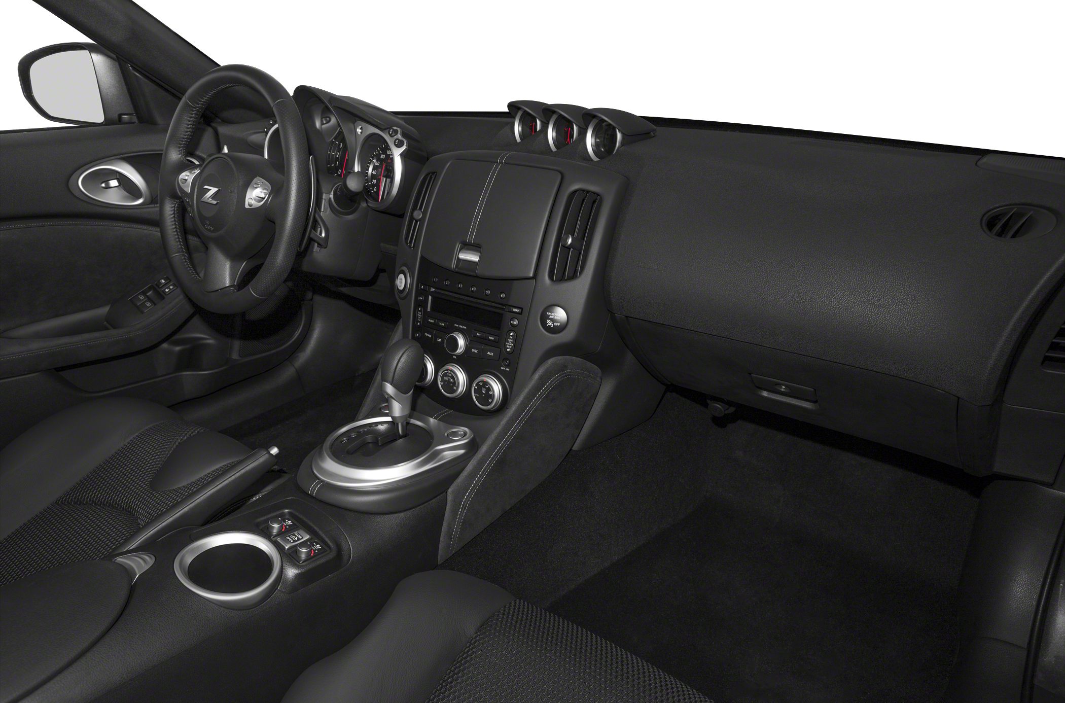 Black interior dashboard, center console, and sporty steering wheel design