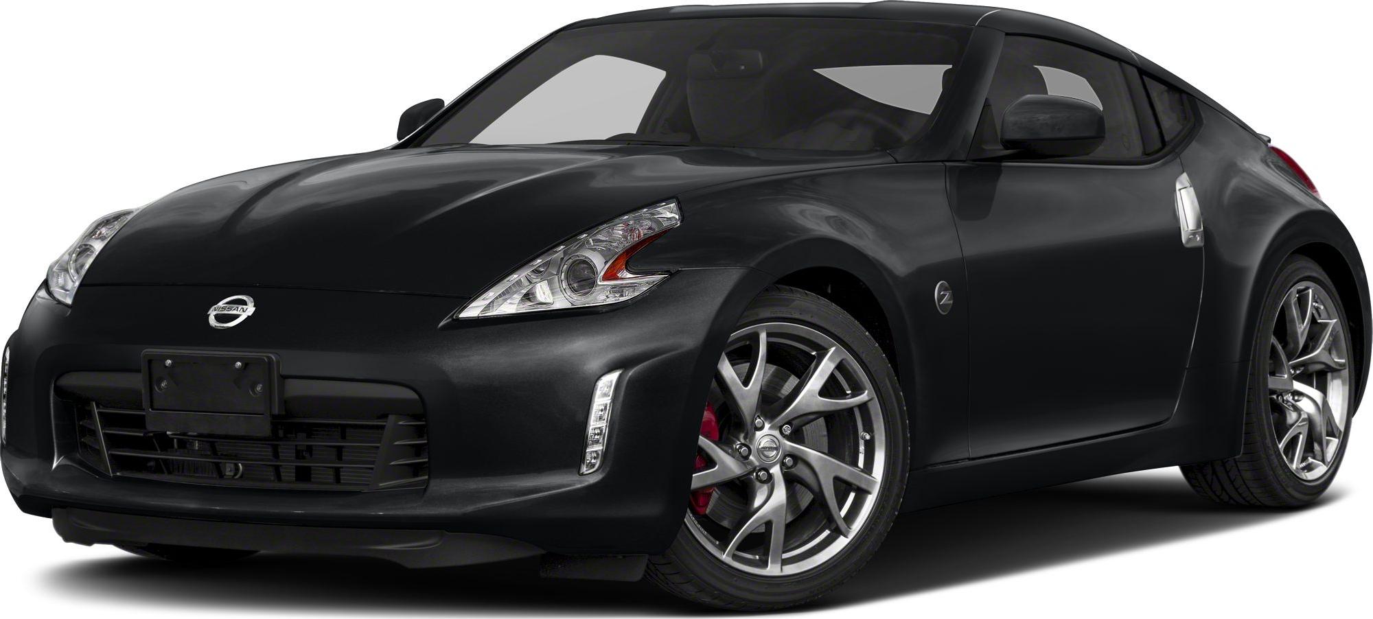 Sporty front fascia and alloy wheels of a black coupe