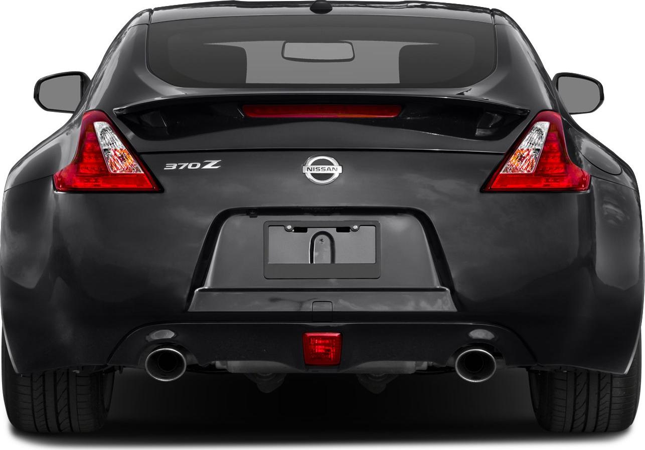 Rear view with dual exhaust and sleek taillights