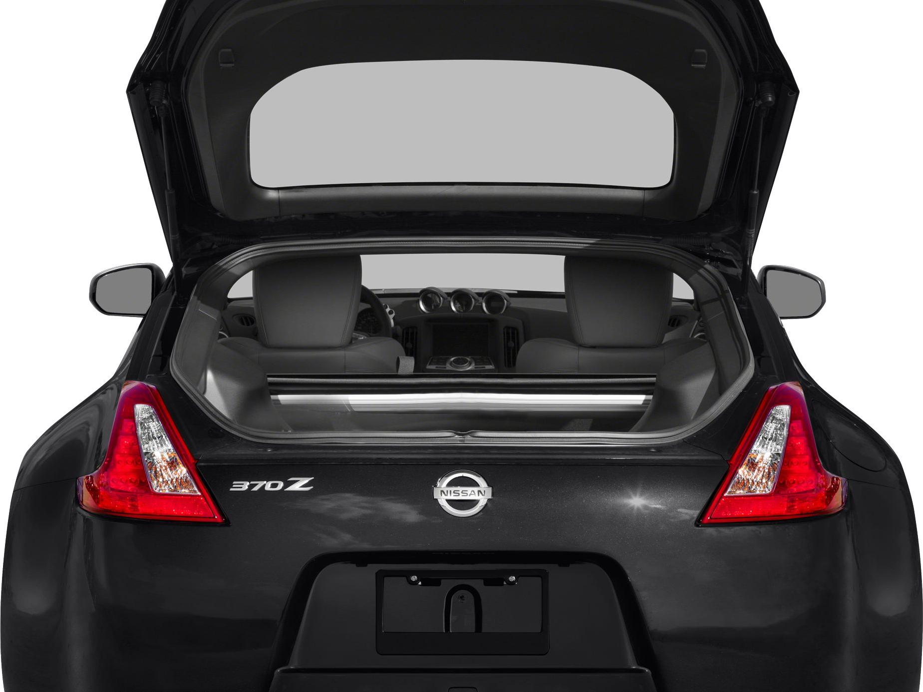 Rear open trunk with taillights and interior seats visible