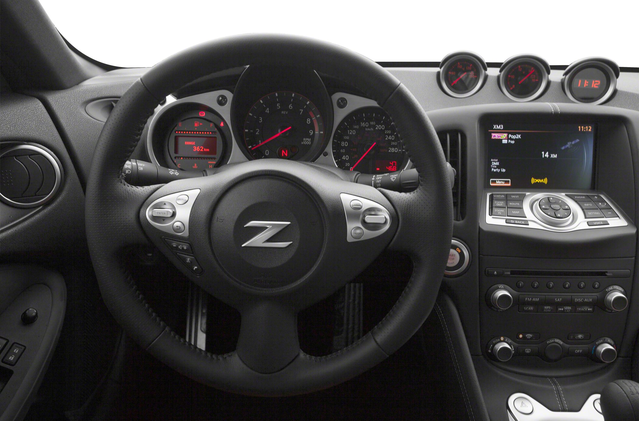 Steering wheel, dashboard gauges, and center console controls