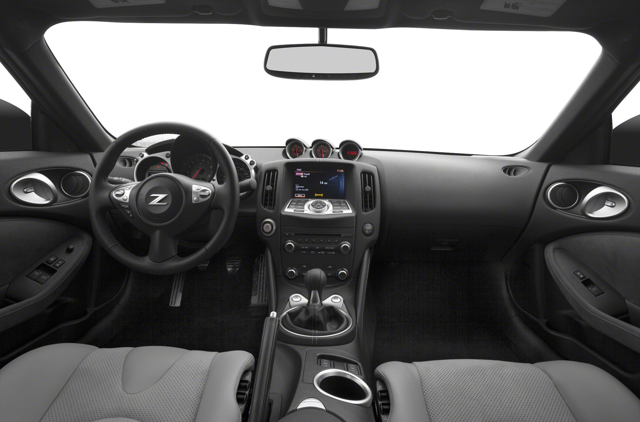 Dashboard, steering wheel with Z logo, center console, and gauges
